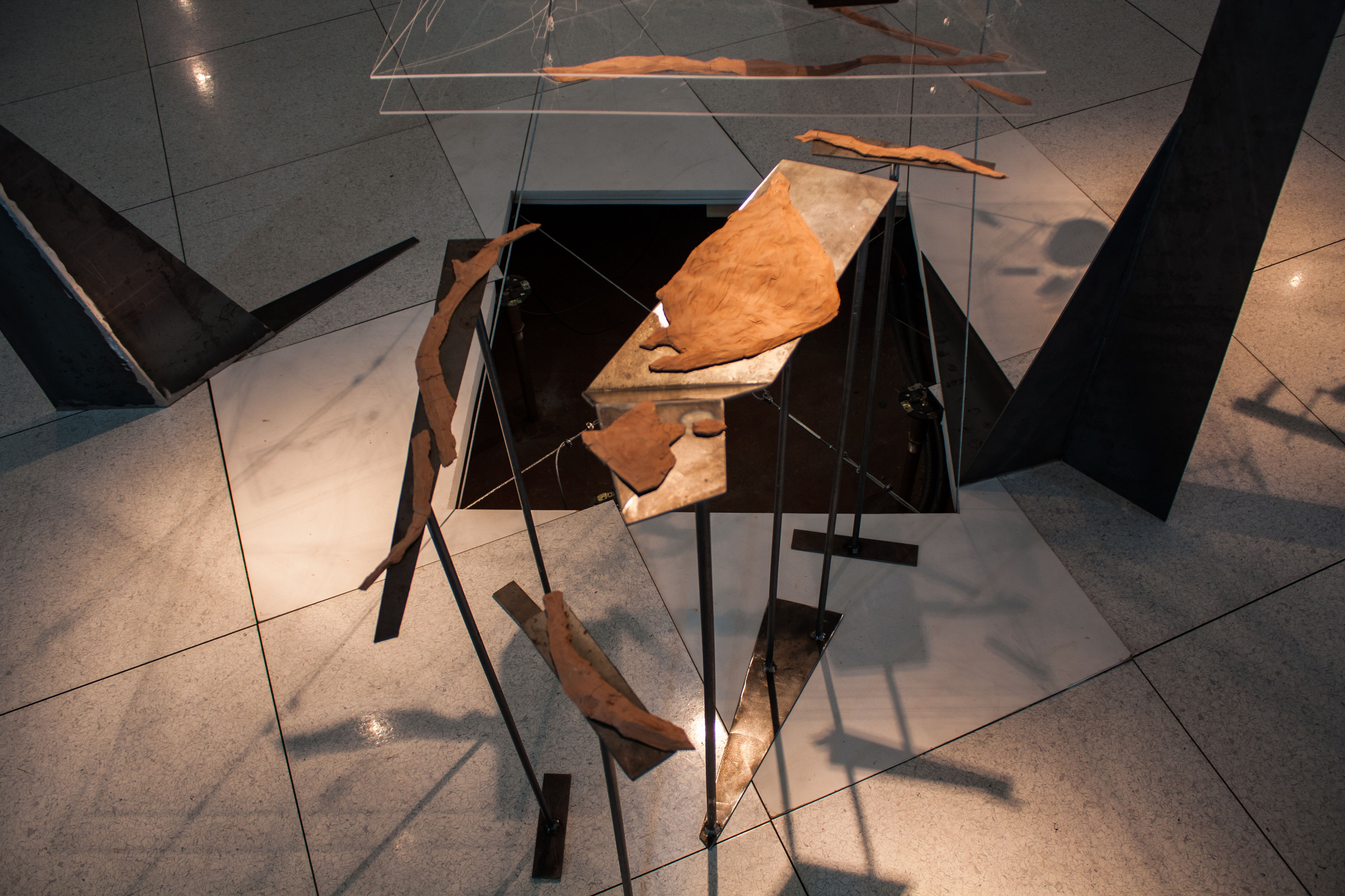 Kaleidoscopic City: The Observatory guiding the observer’s gaze through the slit onto The Mirror, a 25cm square reflector. The same size as the one found in Edinburgh’s Camera Obscura, The Mirror offers a view from above of the terrestrial traces through the Planes’ aerial traces and their tilted view of the city mass. Photograph: Sophia Banou