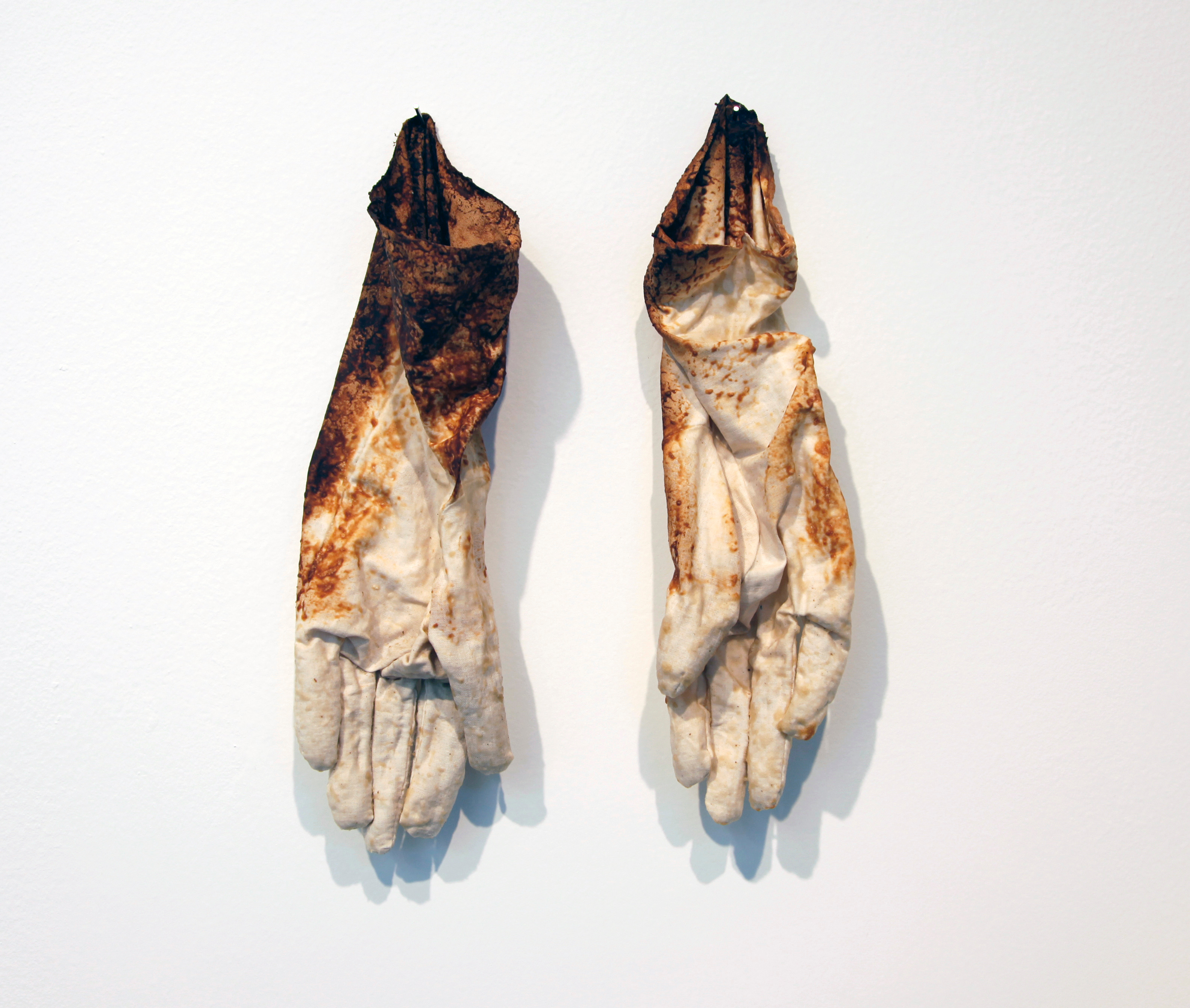 Gloves, 2012Sewn muslin, flour, and yeast, approx. 4" x 8" x 2" each
