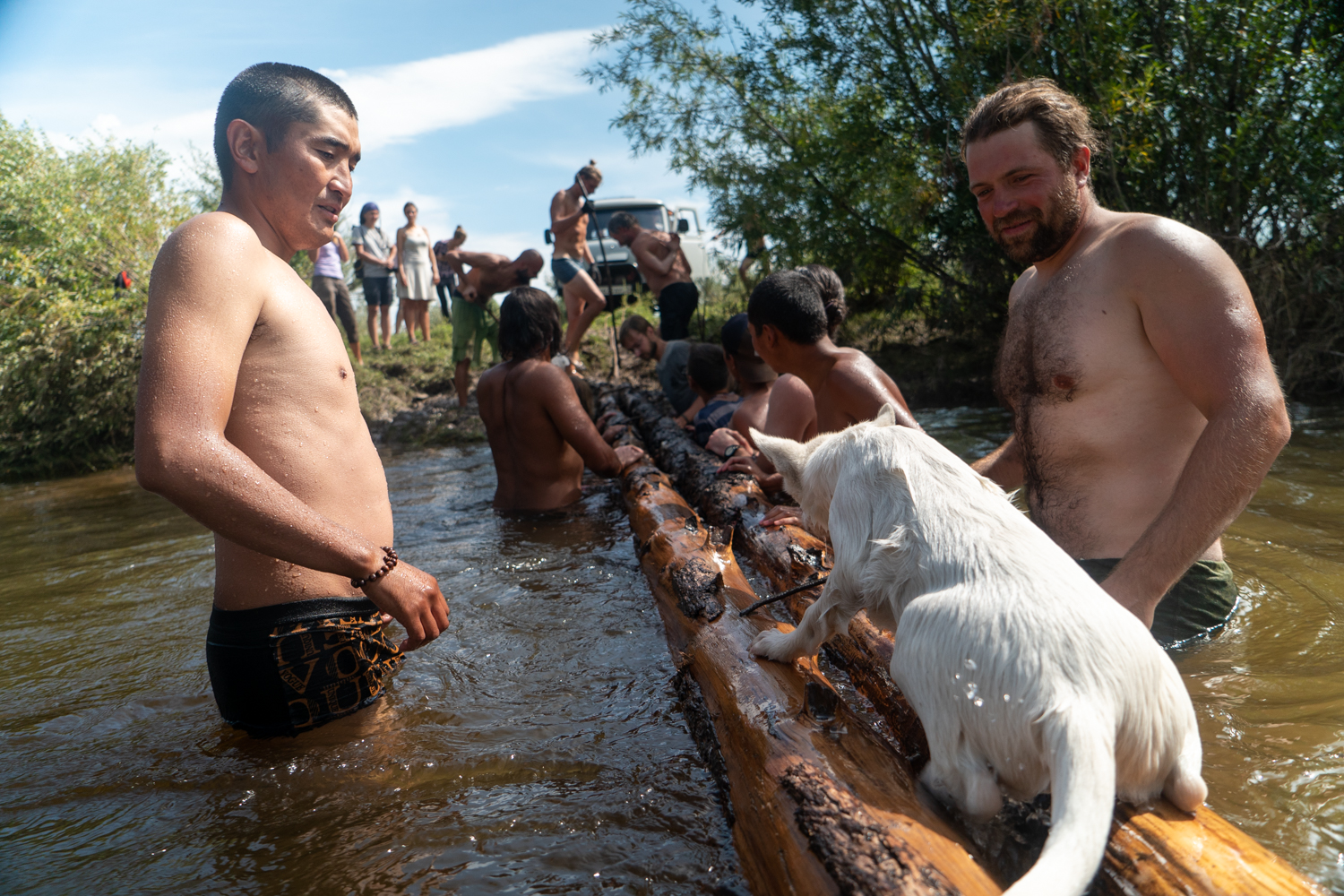Rebuilding the log bridge that floated away in the flash flooding following a violent storm. The weather in the valley is notoriously volatile.