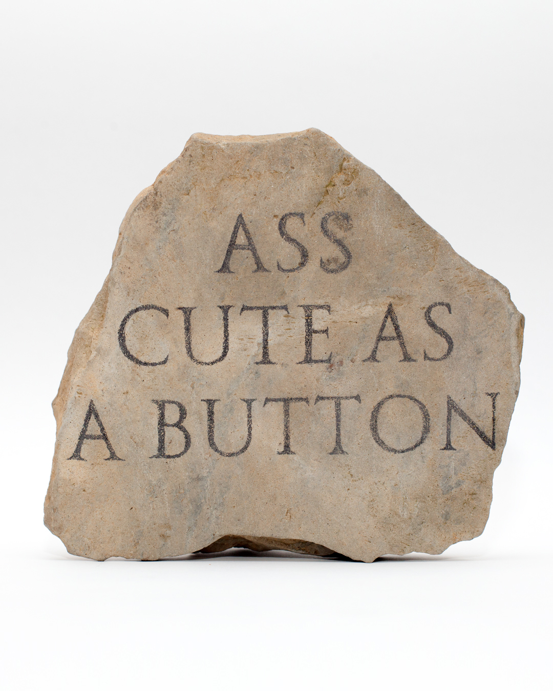"ASS CUTE AS A BUTTON". 2019, pencil on stone, 13 x 15 x 4 cm