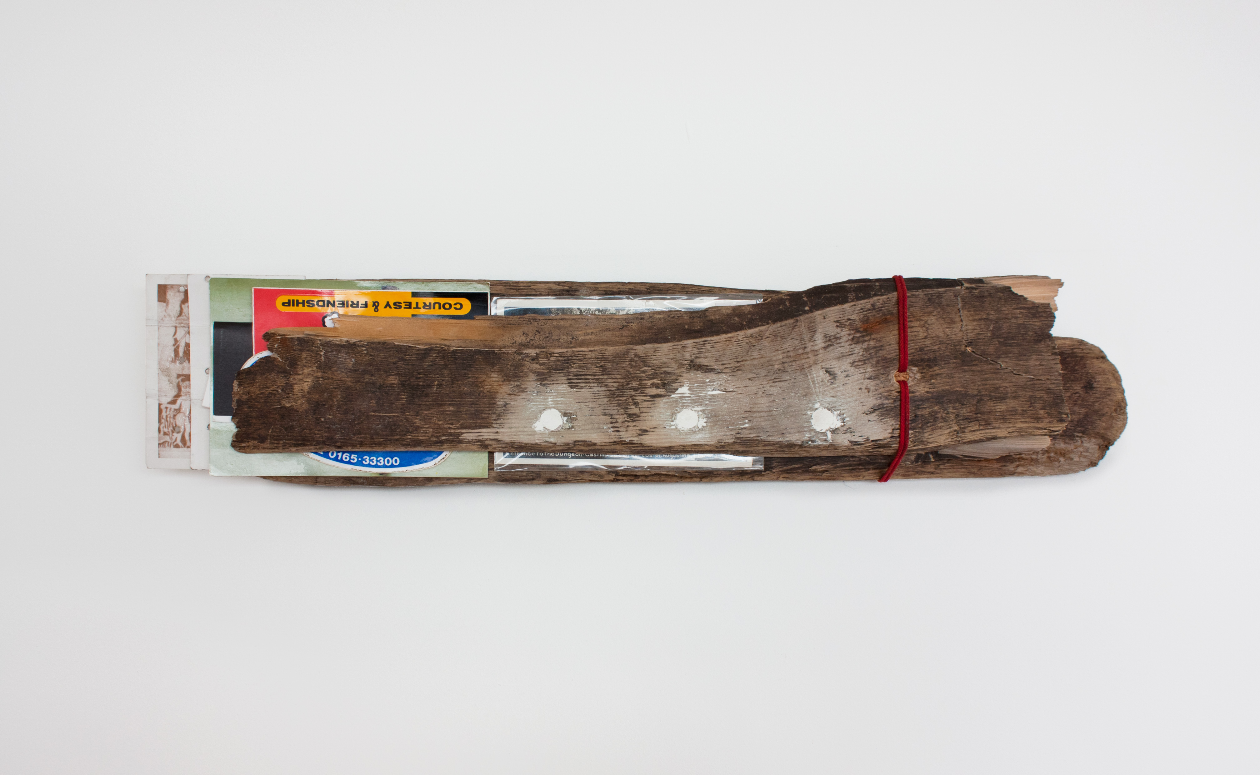 Courtesy & Friendship, 2020  Pine, paper, string, filler, cord  12 x 52 x 7 cm