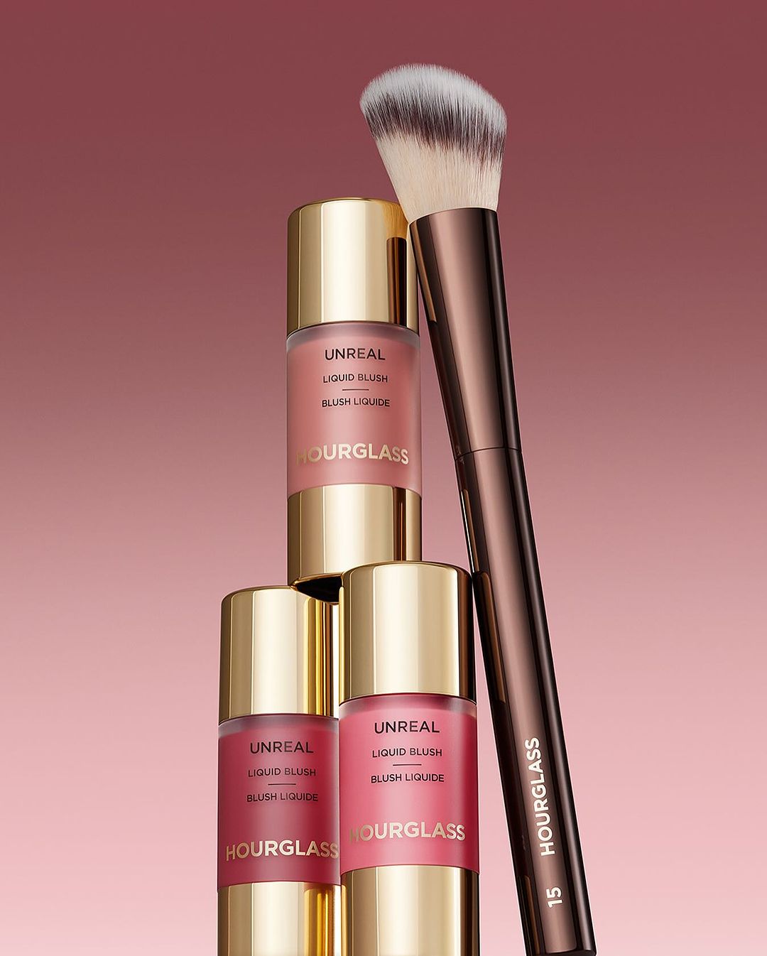 KMA stylist Rachel Haas designs set for photo of many shades of concealer sticks on black background for Hourglass 