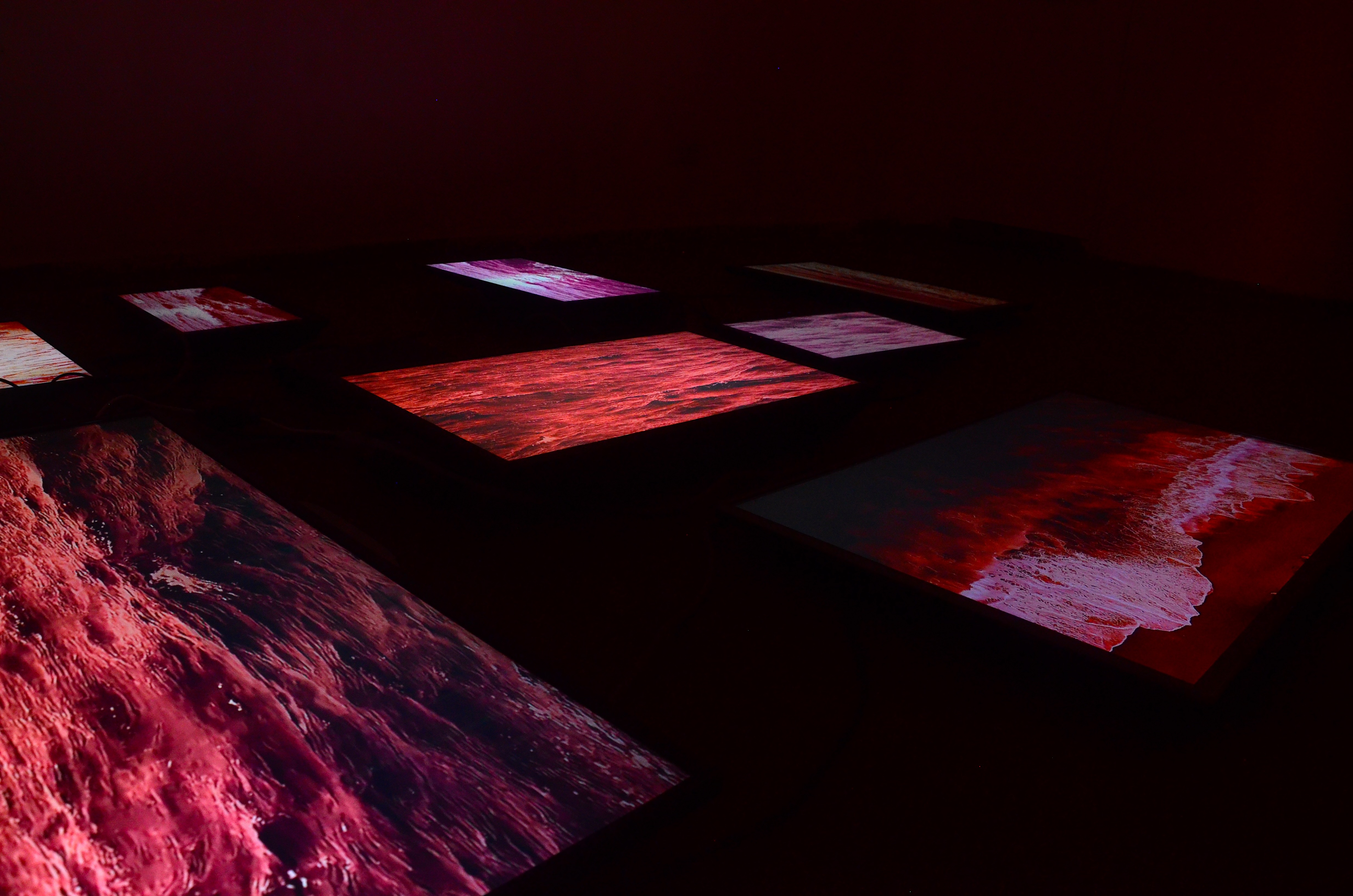 Exhibition view of 'Red sea' multimedia installation at self-managed cultural space 'Casa de Mamus'