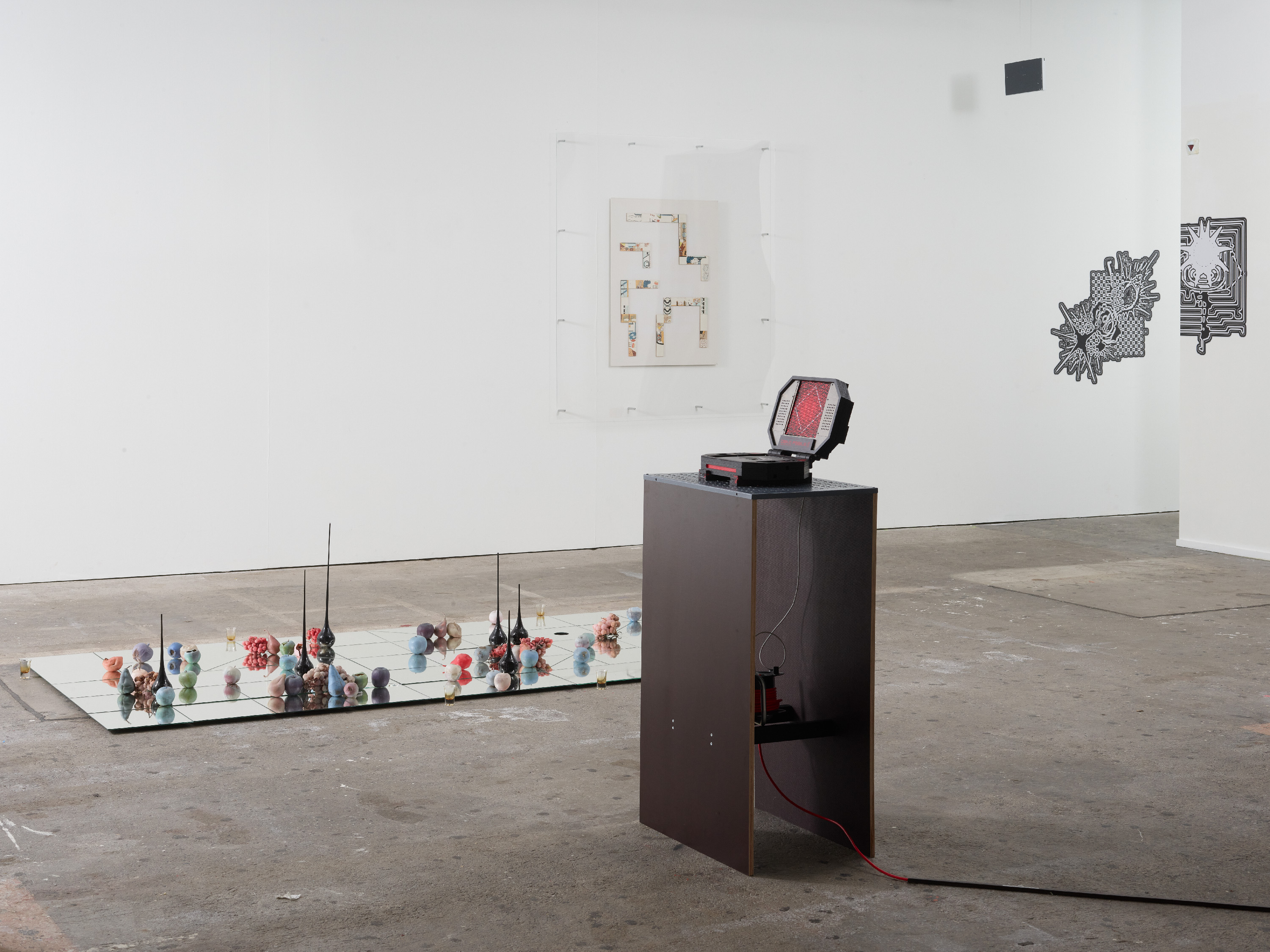 A non playable wood video game console reinterpretating the code of the conway life game an celd automaton from the 70s. The console represent a small stadium with a lot of gladiators pixels fighting to death