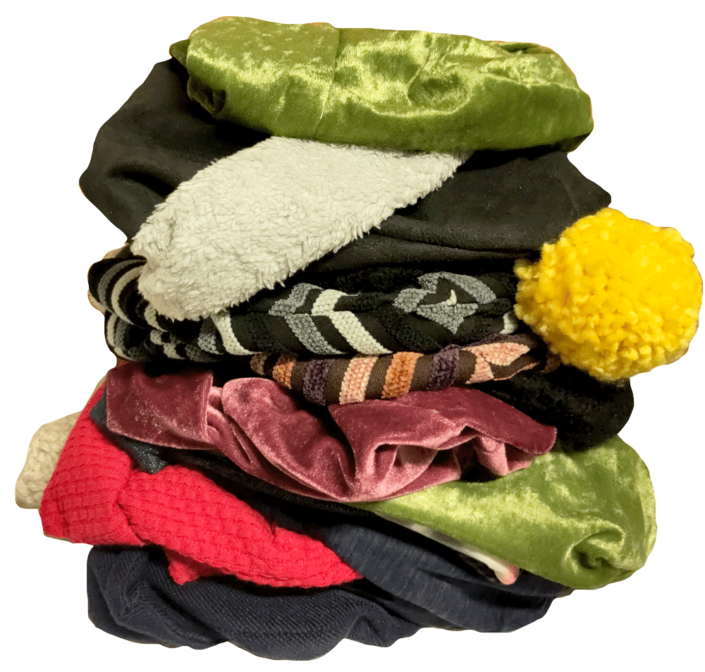 A stack of hand-made winter hats, ready to be donated, 2022