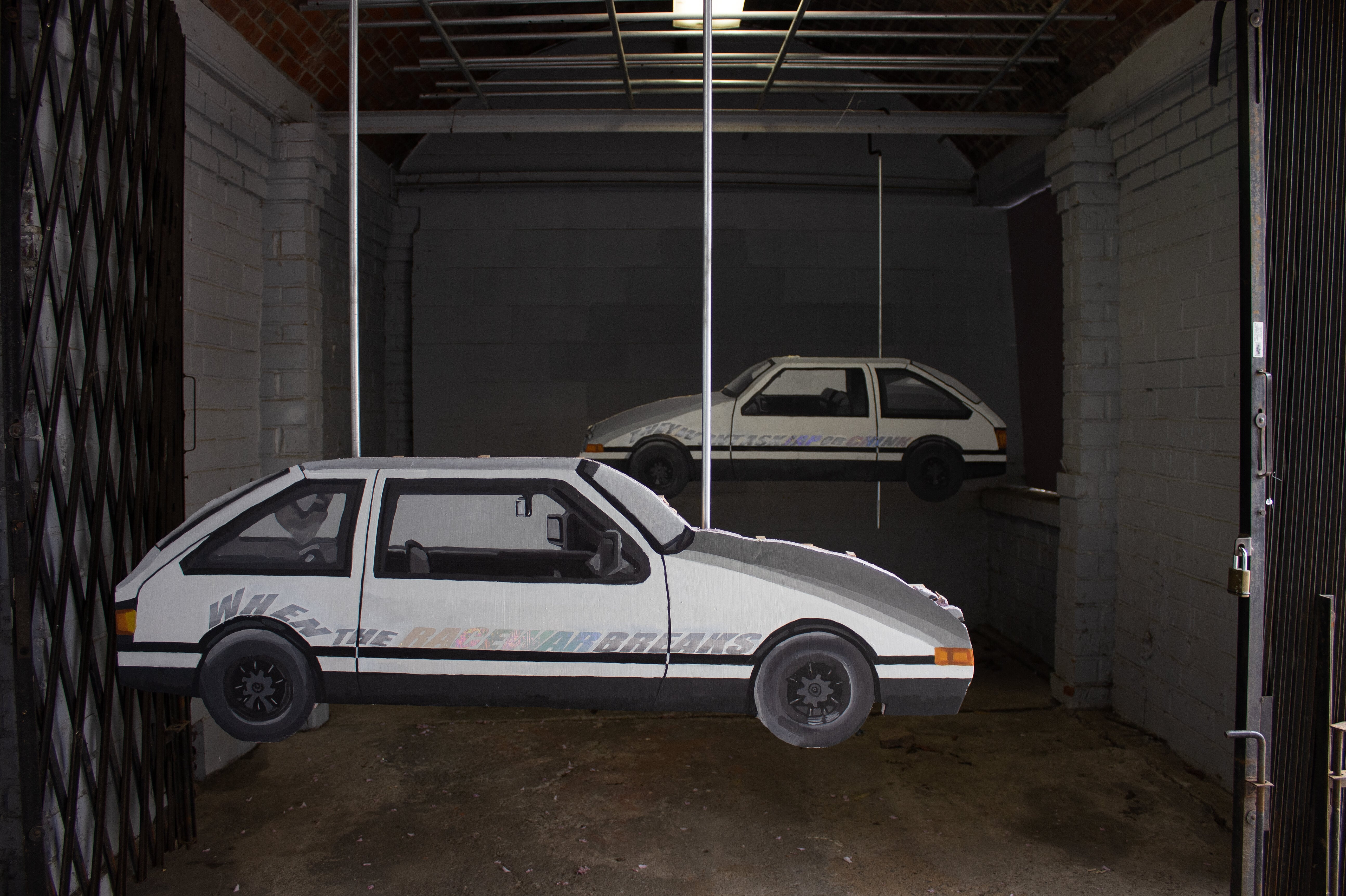 ACCELERATIONIST, 21in x 62.5in, 21in x 62.5in [diptych], Oil and holographic vinyl on foam, 2022