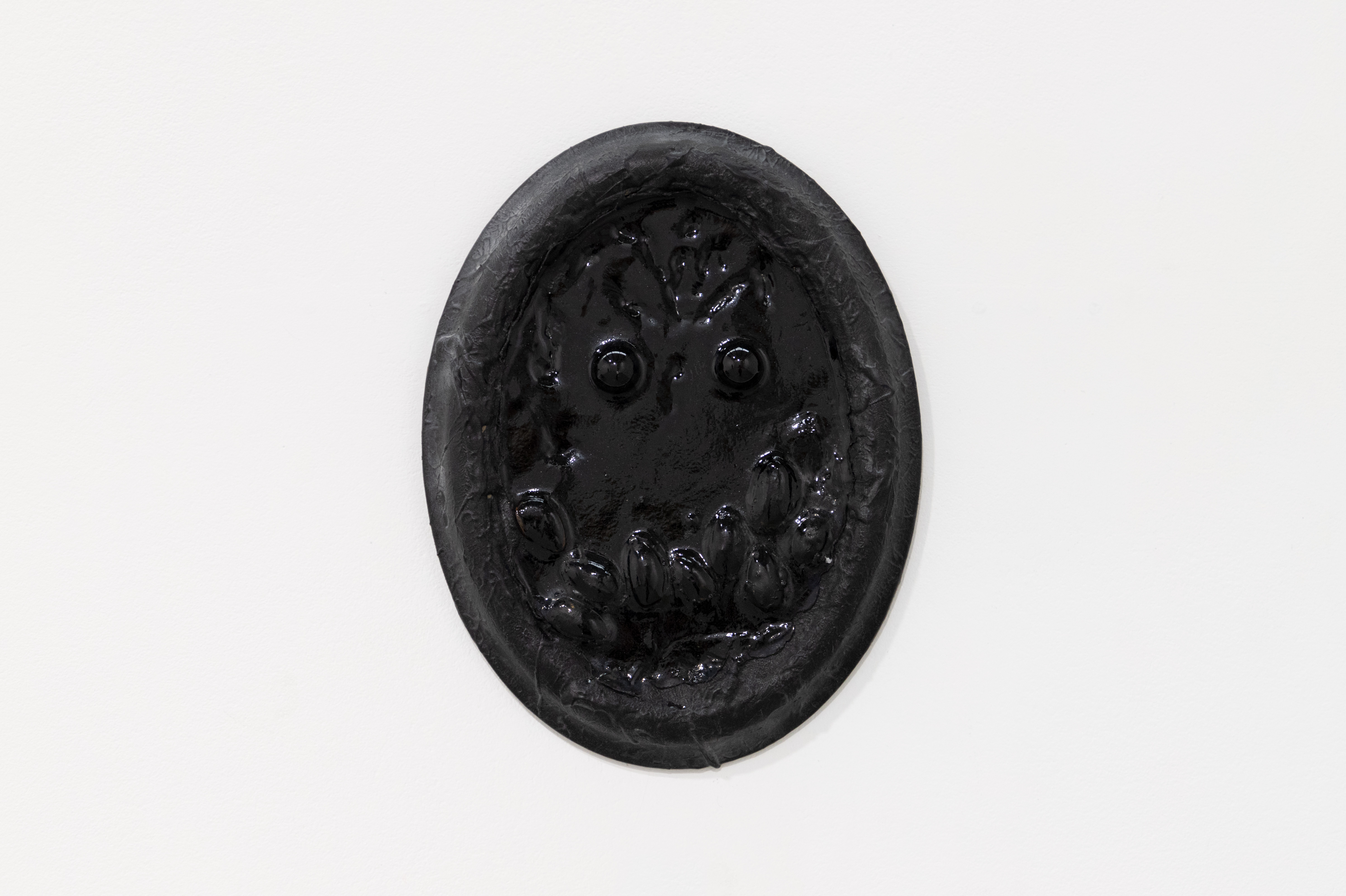 i am nuts 4 u, marbles, black aluminium foil, almonds, resin and modified frame, 2022. Photography by Teagan Ramsay.