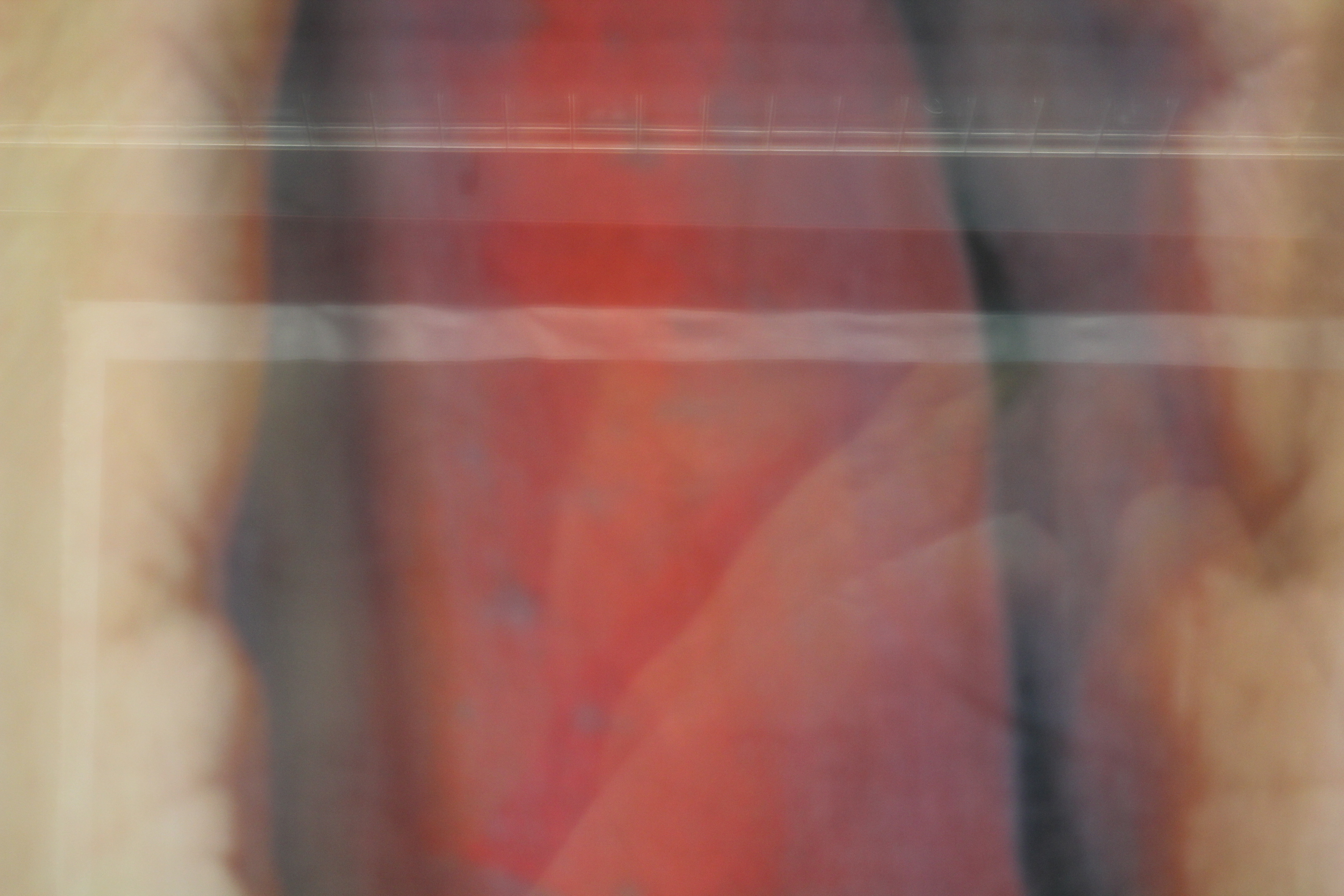 Transparent voiles ghost the images onto one another