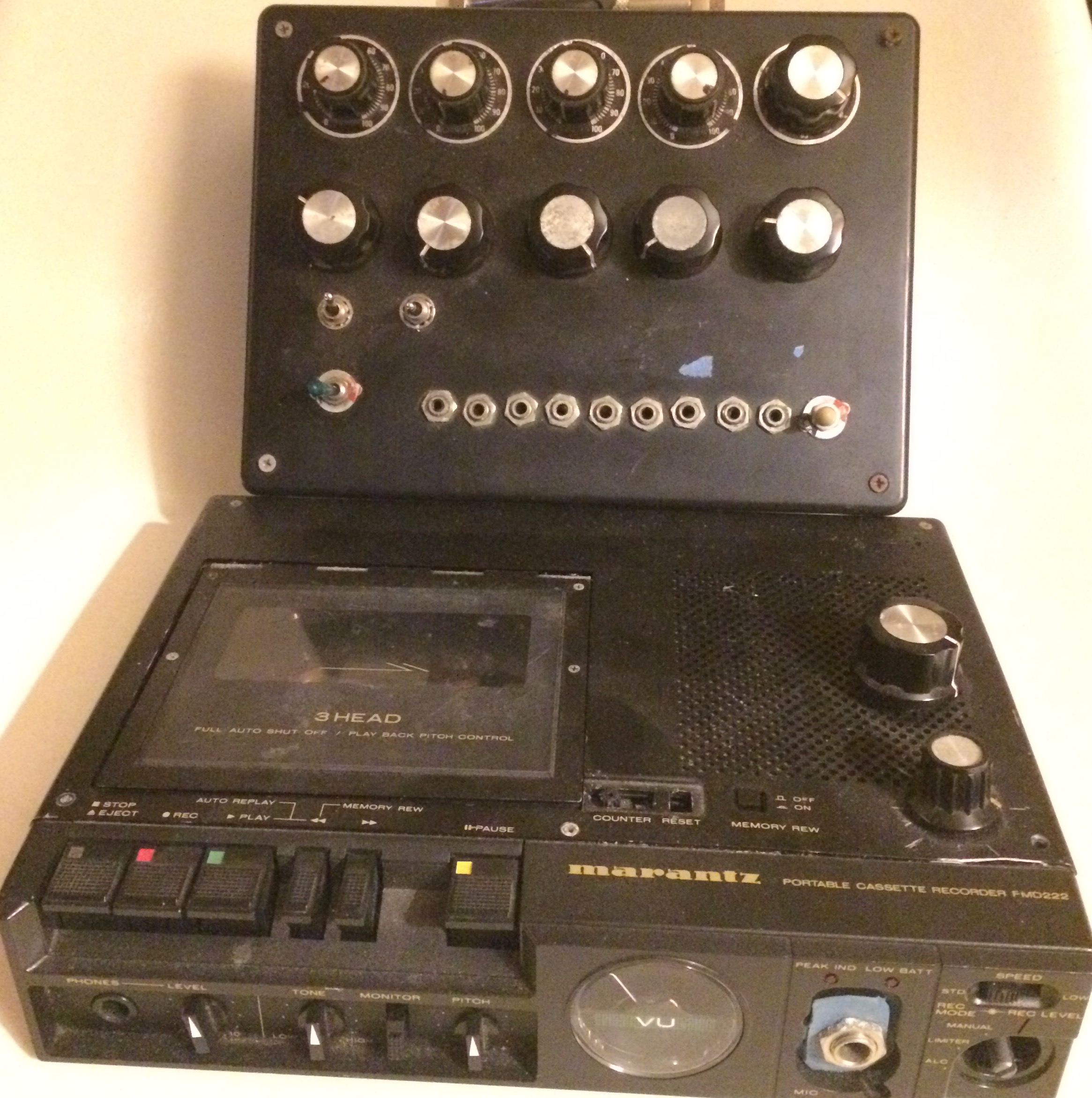 "On the top is a old noise box with a Bug Brand Weevil and a Korg Monotron rehoused for easier playability. On the bottom is my original Marantz 222. It has erase head and speed control mods. Both were made around 2007." -Nate