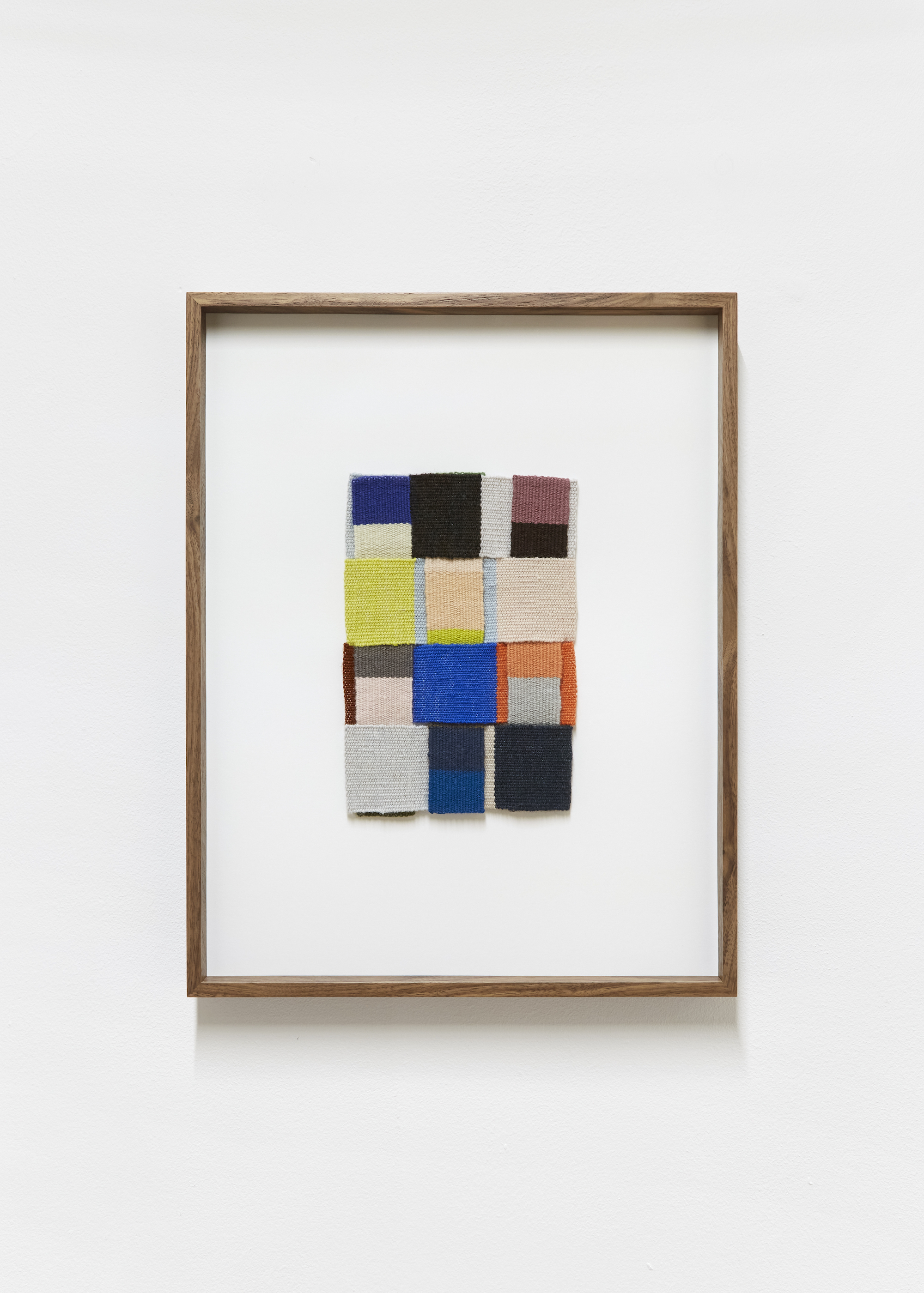 A Million atoms of soft blue (2021) Handwoven wool tapestry, Walnut frame. 35.5 (w) x 46 (h) x 3.3 (d)