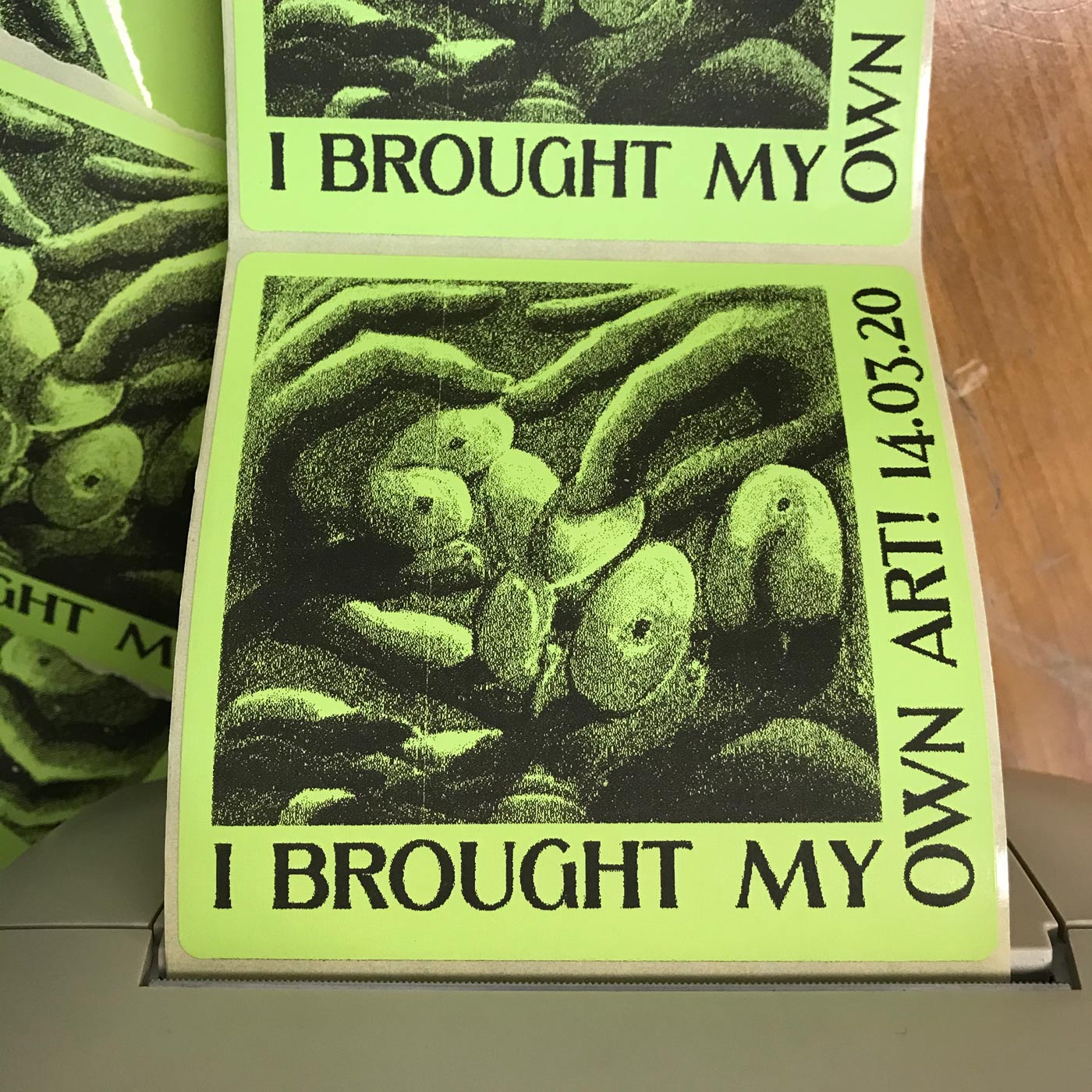 Sticker for exhibitors at the Bring Your Own Art Exhibition.