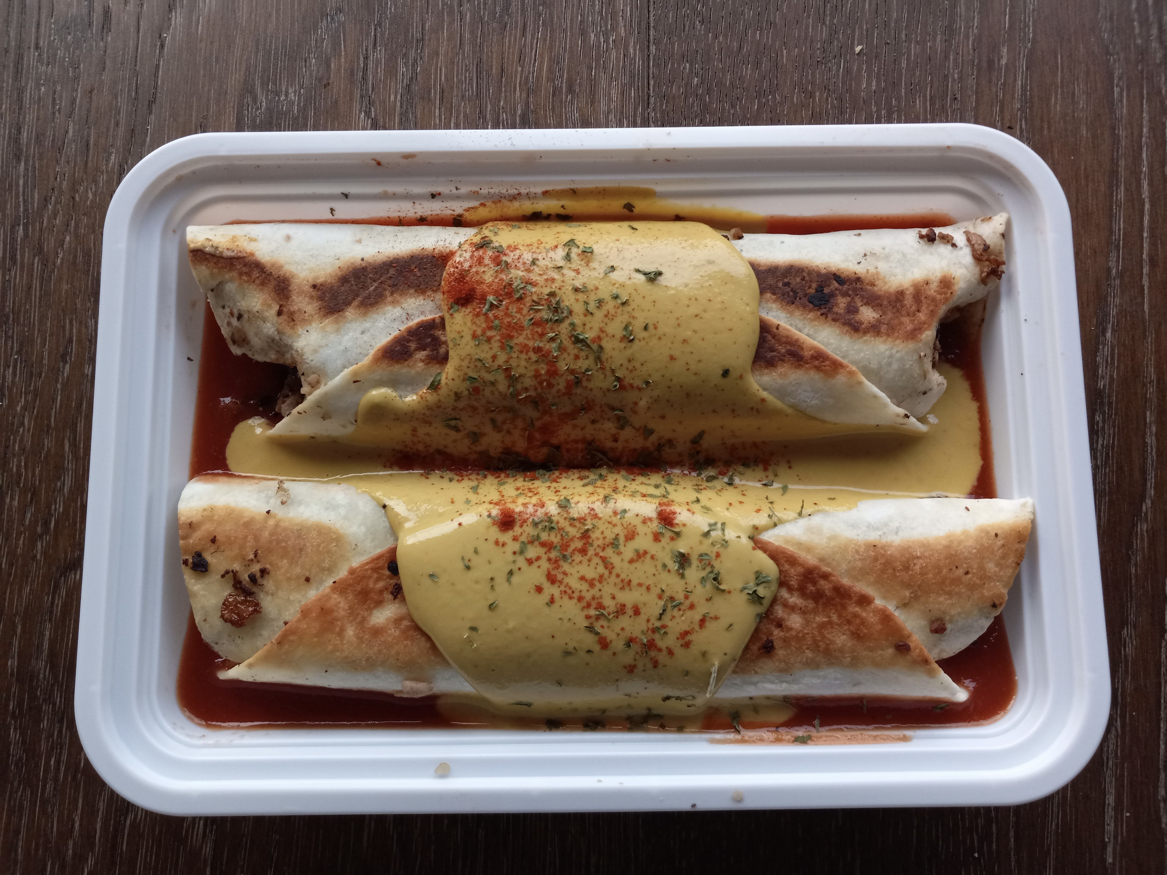 Delivered Vegan Meal: Enchiladas in Salsa Roja & Topped with Cashew Nacho Cheese
