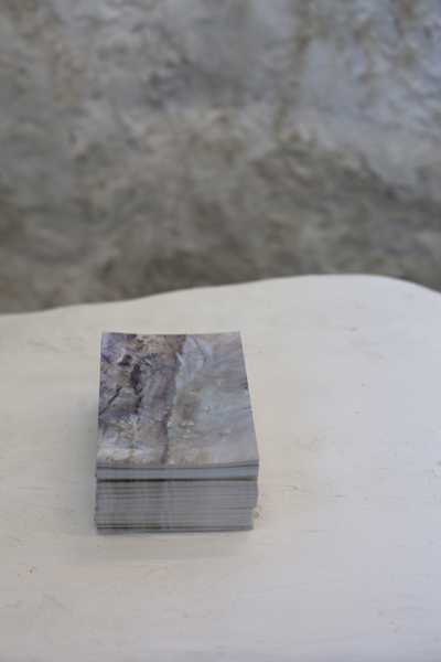 Untitled, 2013, variable size, hay bales, plaster, chalk-board paint, chalk, video, postcards