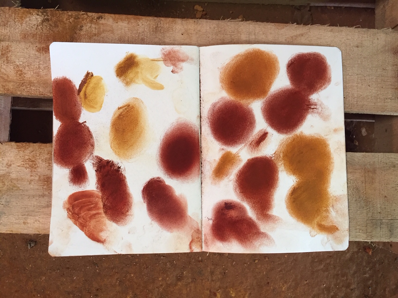Sketchbook pages comparing burnt and raw ochre