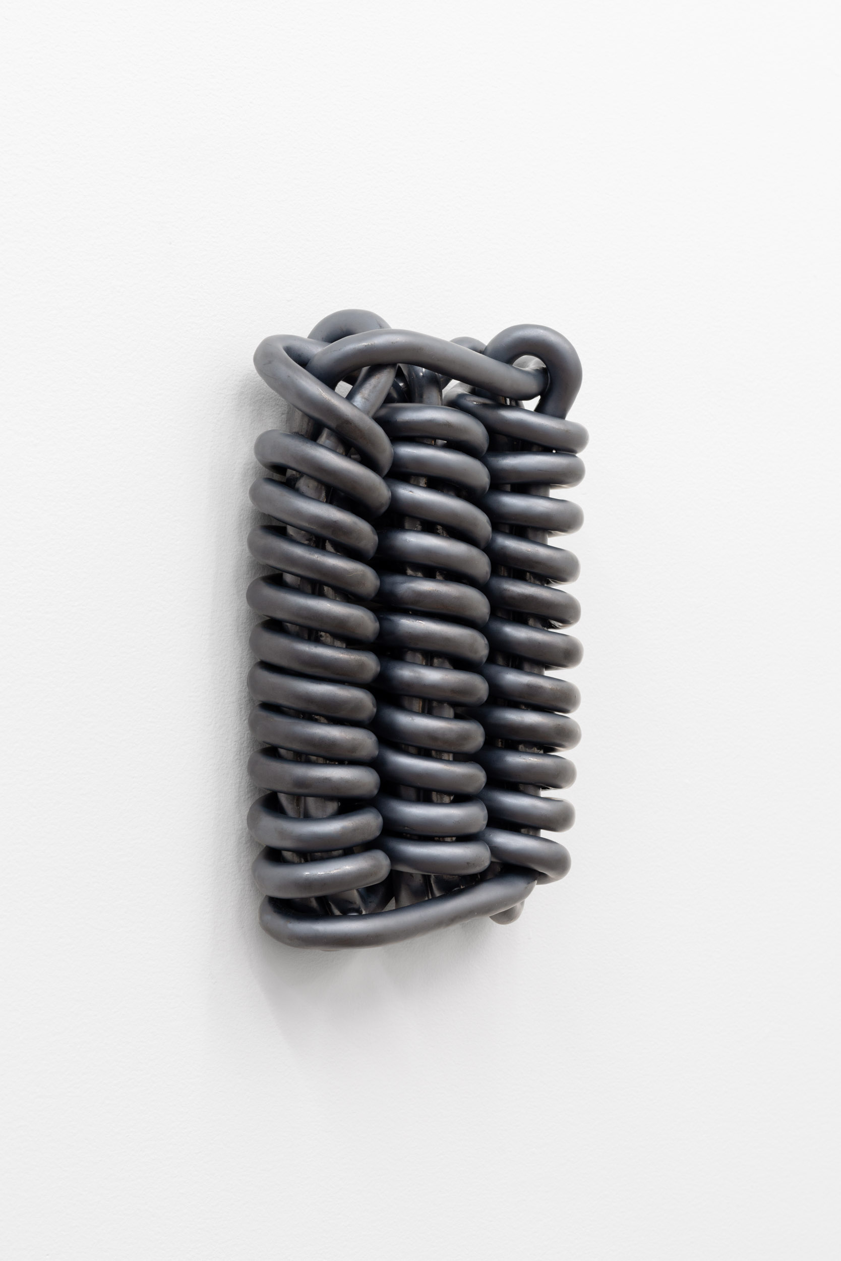 Nicole Ondre, Impeller, 2024, 12”x 8”x 2”. Glazed ceramic.