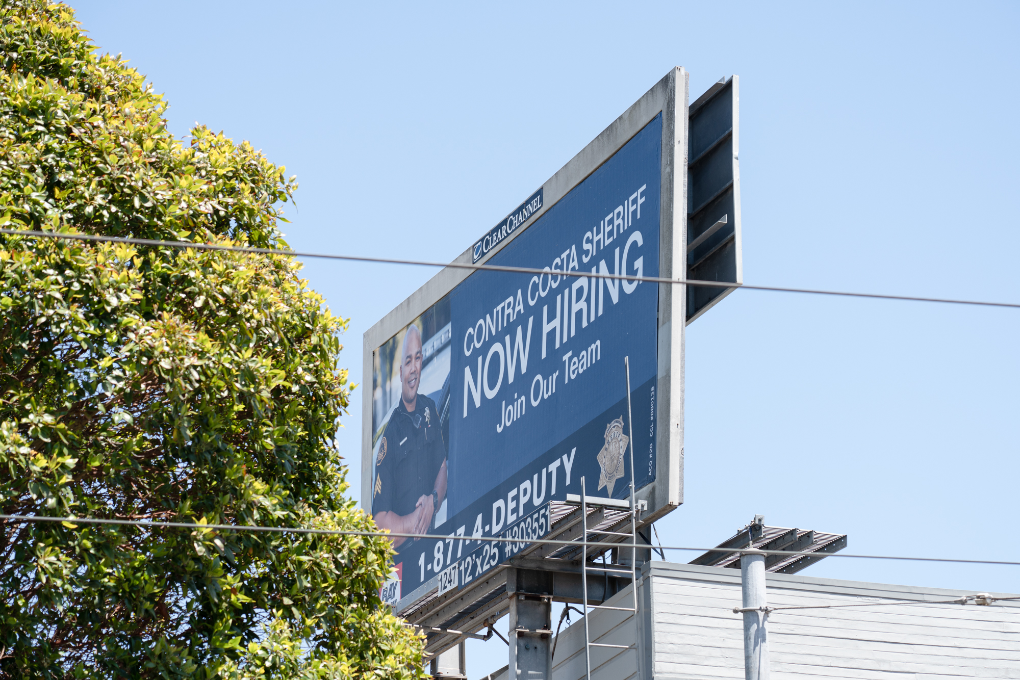 At the time of install, the billboard on Premiere Jr.’s verso was a recruitment ad for the Contra Costa Sheriff’s department