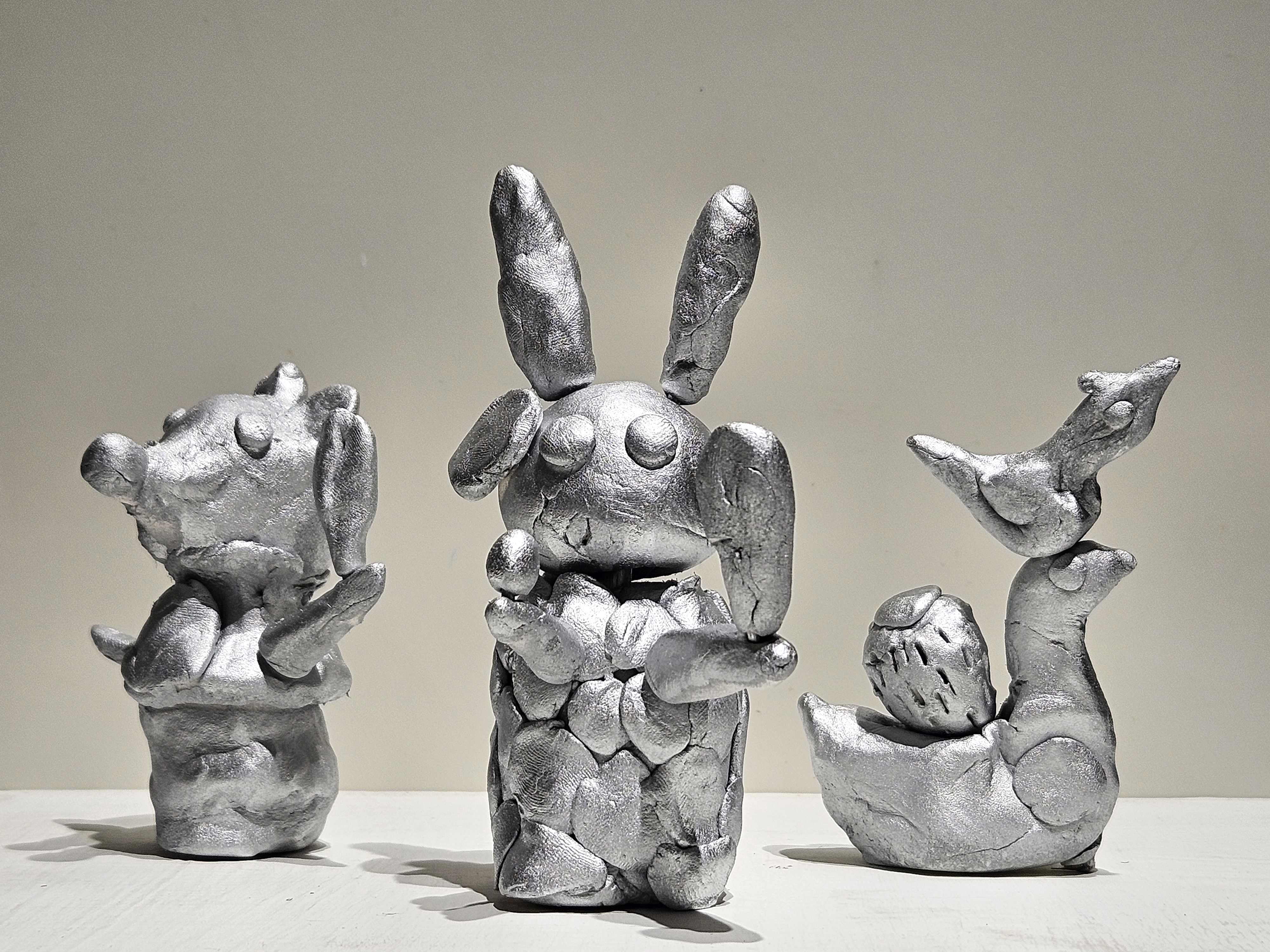 銀色小鴨、銀色小熊、銀色小兔子。Silver Duck, Silver Bear, Silver Rabbit。Japanese modeling clay, silver paint   8.8 ×  5 × 3 cm、8 ×  6 ×  9 cm、11.5  ×  4.5 × 9 cm ,   2023