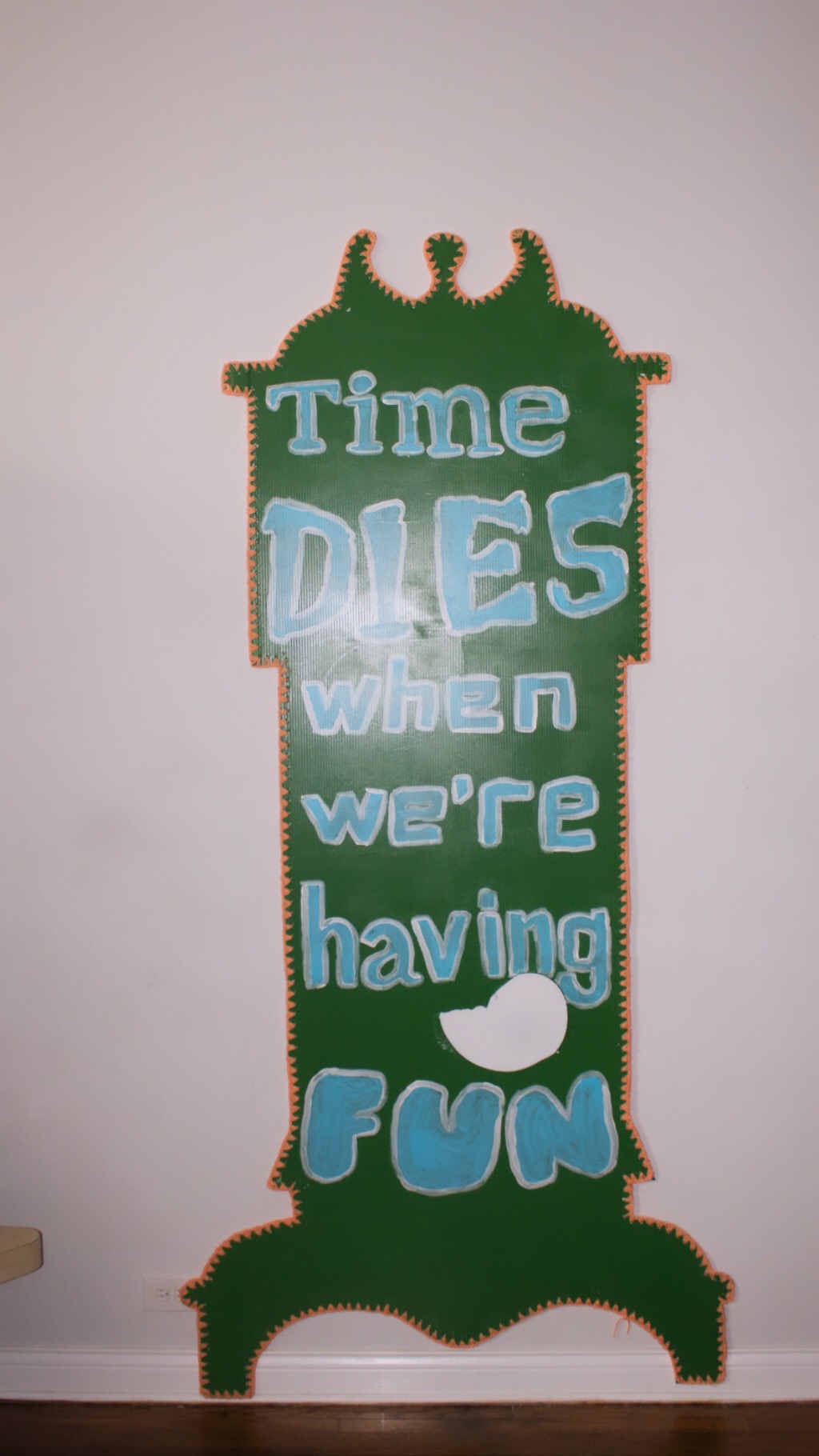 Painting and crochet on corrugated plastic; hole rubbed by enthusiastic party goers