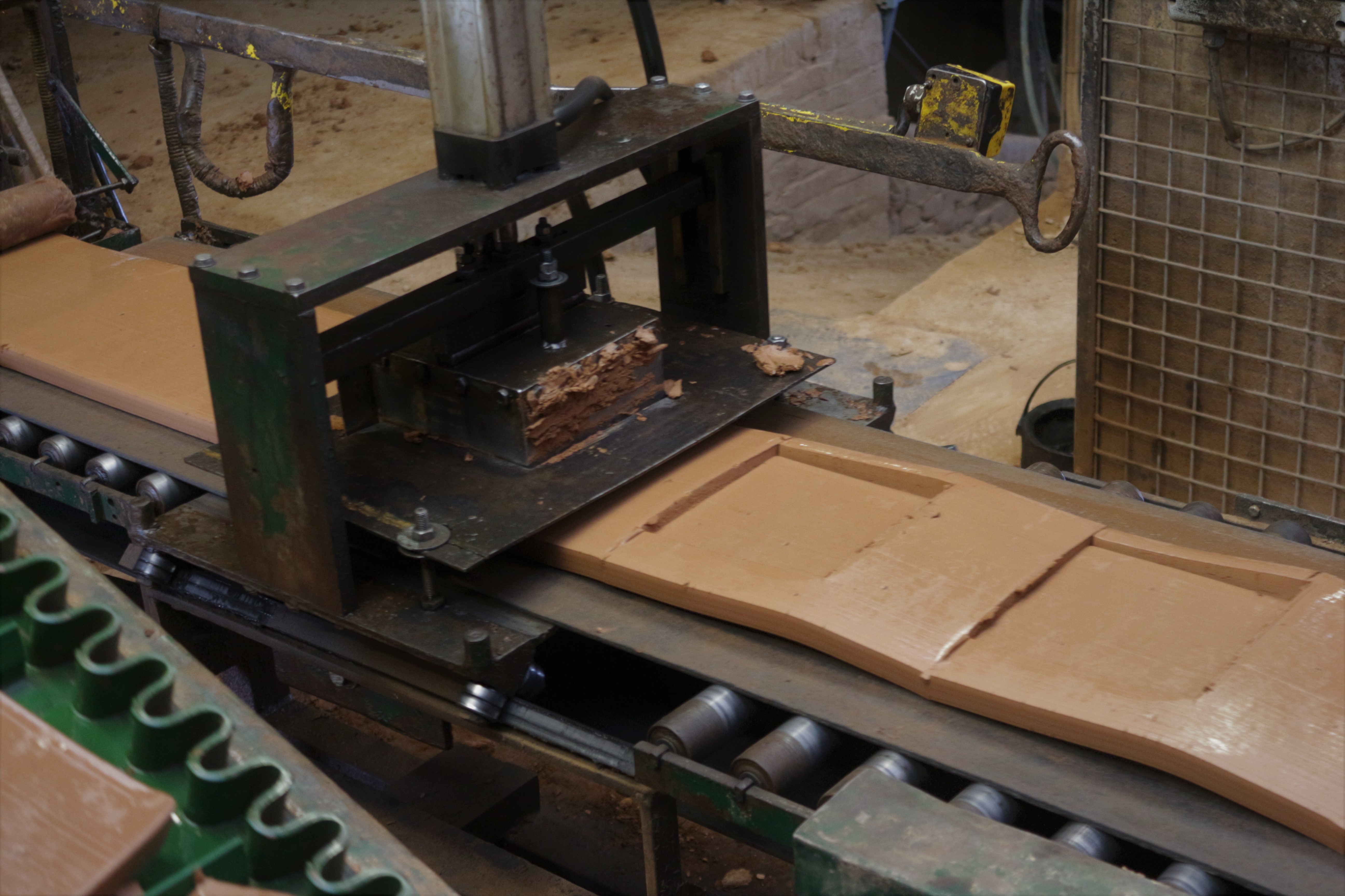 The mass is then laminated and cut with a mould 