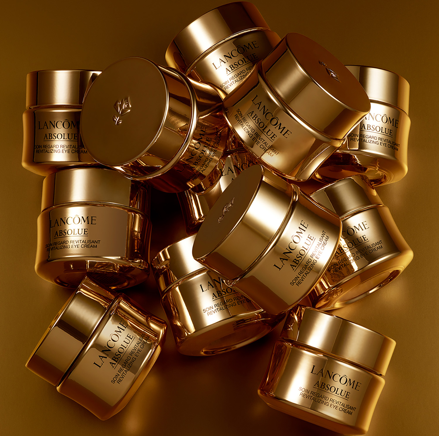 KMA photographer Isabelle Bonjean shoots photo of several Lancome eye cream bottles stacked on top of each other