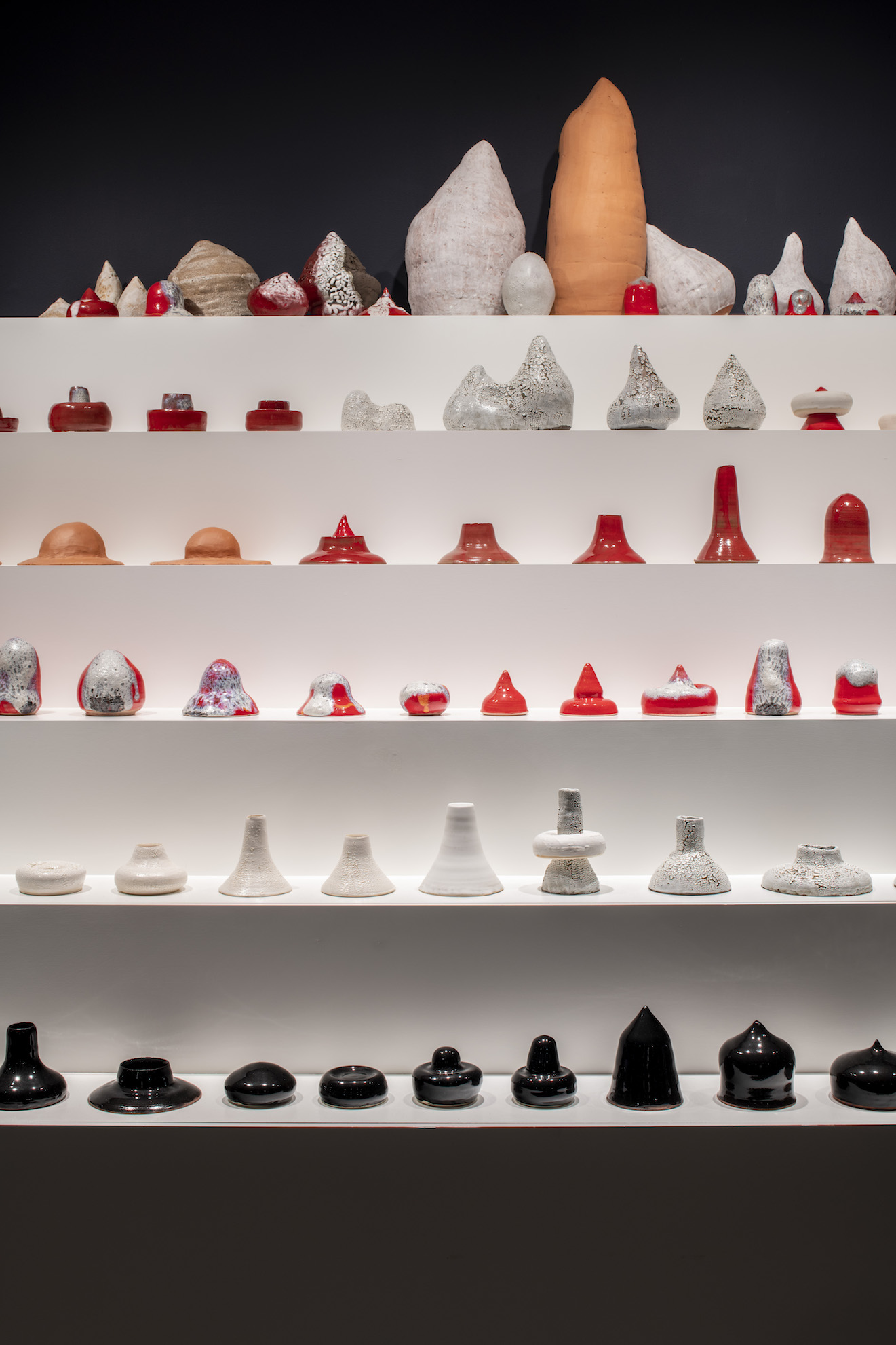 I opened up the radio but there was no-one inside (detail), 2022, fired and glazed clay on stepped display