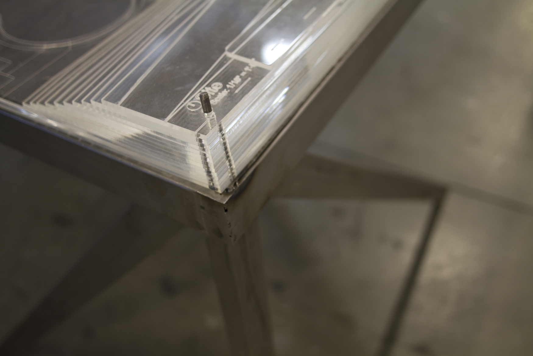 Steel Pin Secures Acrylic