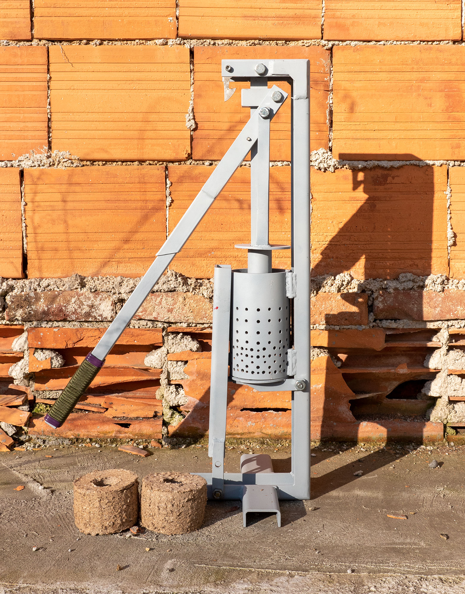 Briquette press, 2011