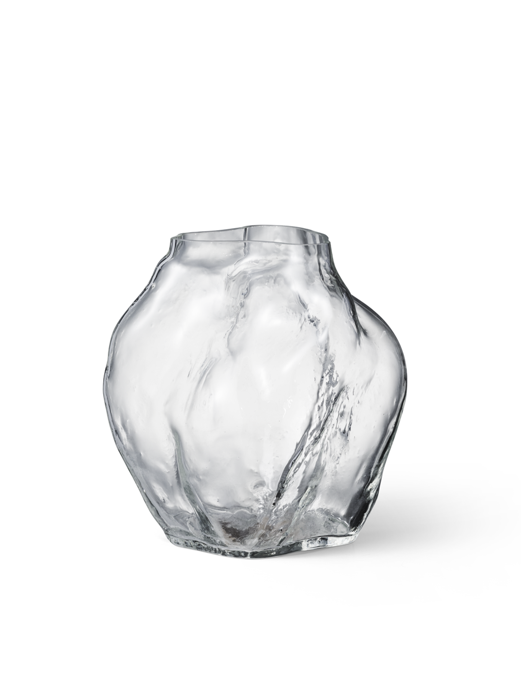 BLÆHR VASE FOR NEW WORKSThe Blæhr Vase tests the boundaries of mouth blown glass with a timber moulded form that grows with each edition. An organic object that pushes and pulls the hot glass to take a unique and irregular form. Reflections hit the undulating exterior of the vase; complete with bubbles and streaks lifted from the timber mould, to create a centerpiece with depth and character.Go to product page →