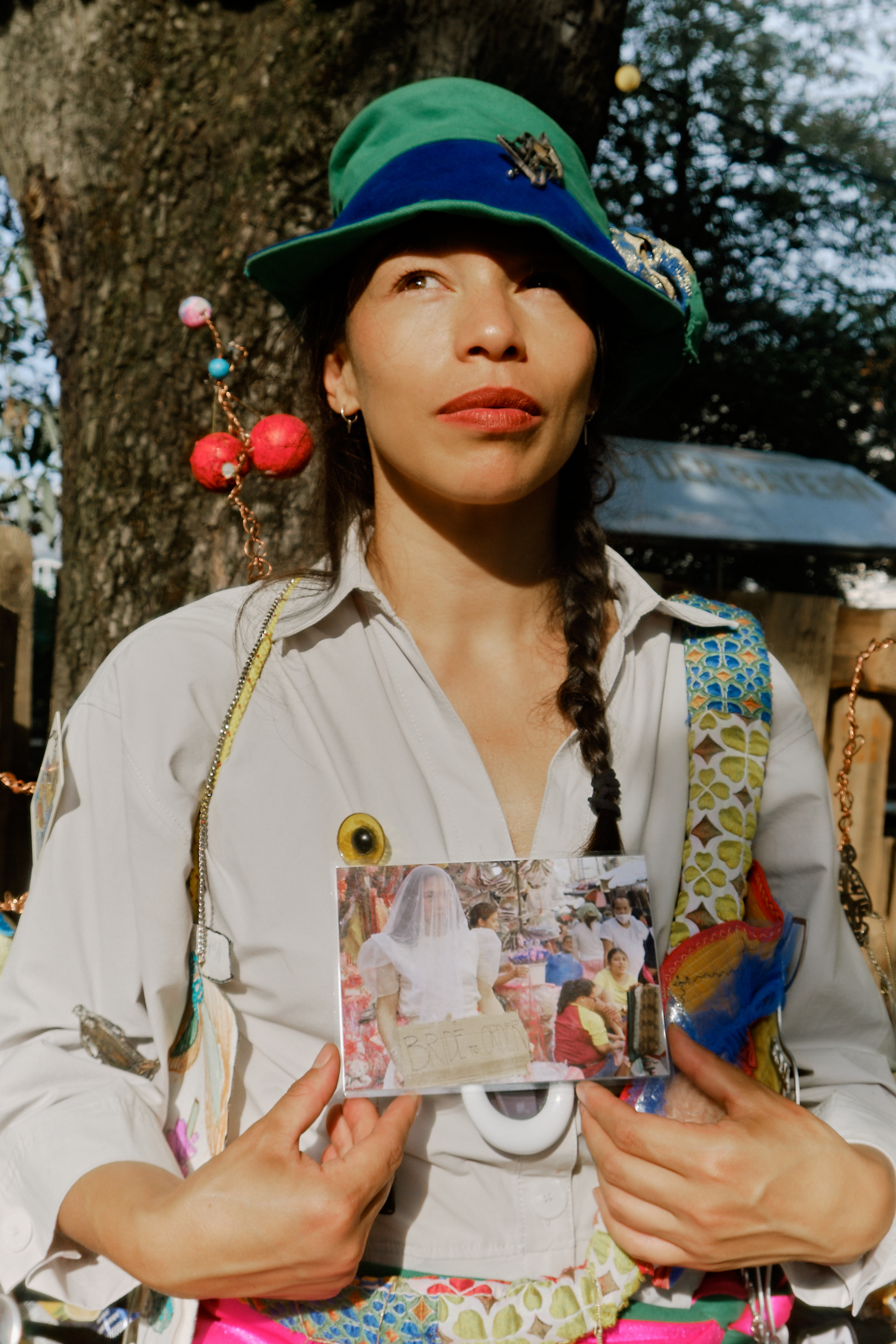 Memory Person Kathrin Knöpfle with her memento 'BRIDE TO ORDER.' Munich, 2024. Photograph: Sandra Singh.