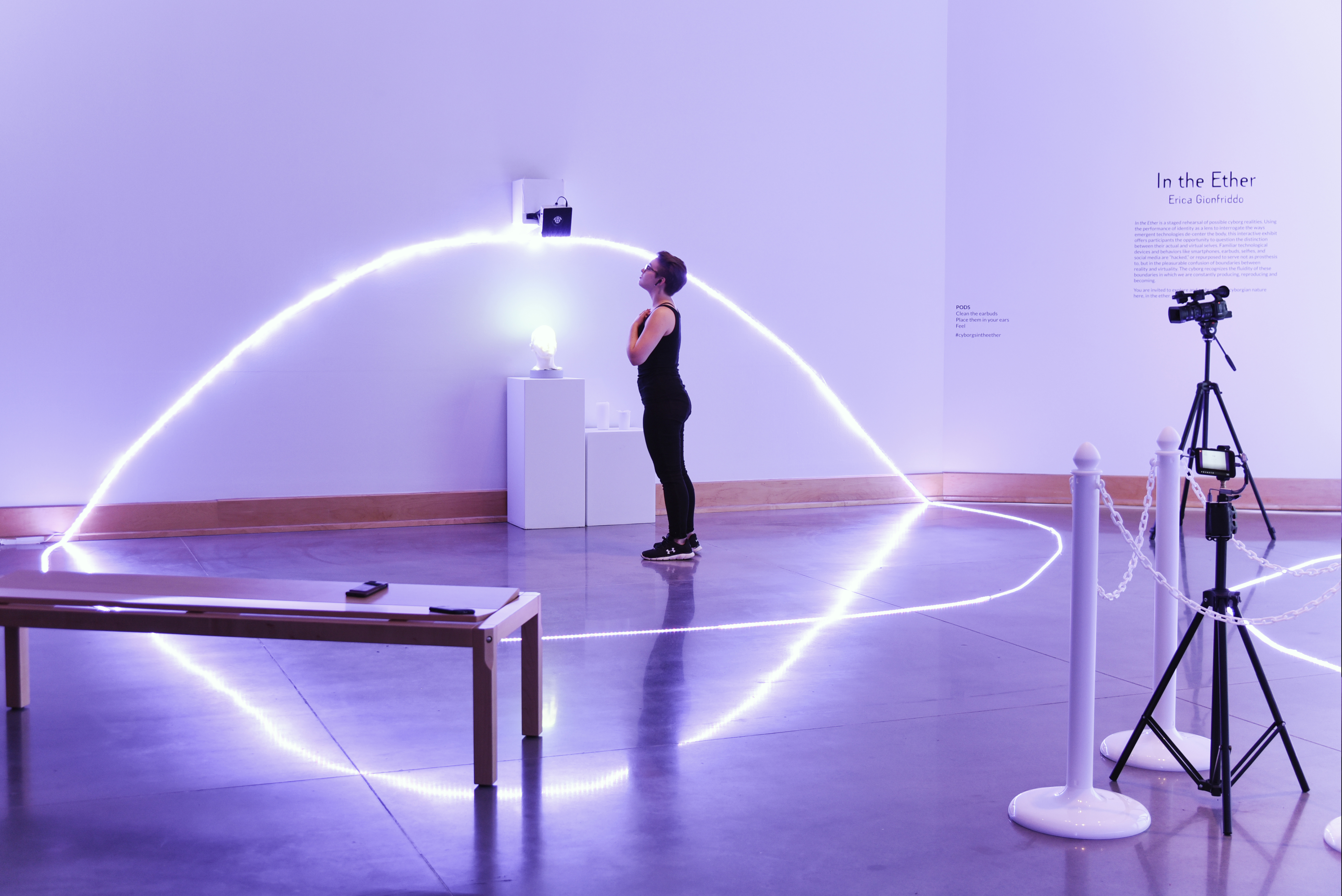 Visitor interacting with “Pods.” Photo by Kyra Schmidt.