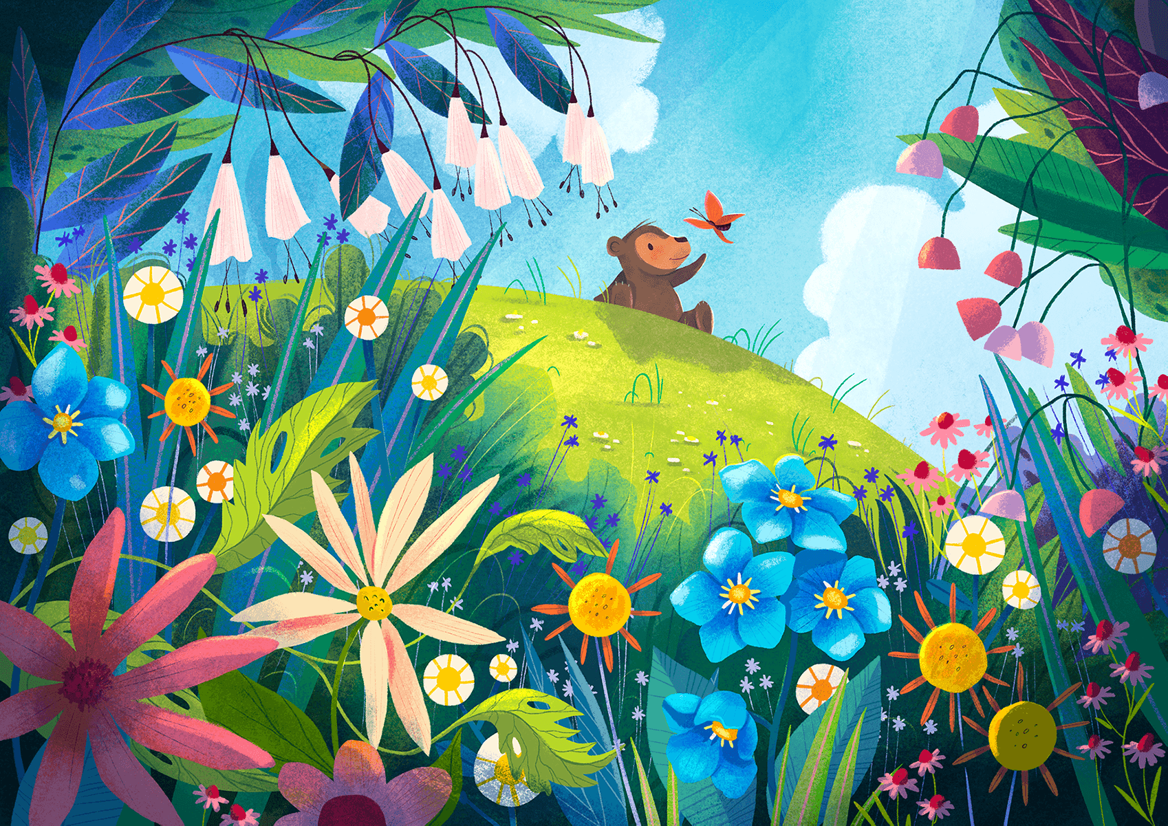 A bear cub plays with a butterfly, sitting in a spring flowery field. 