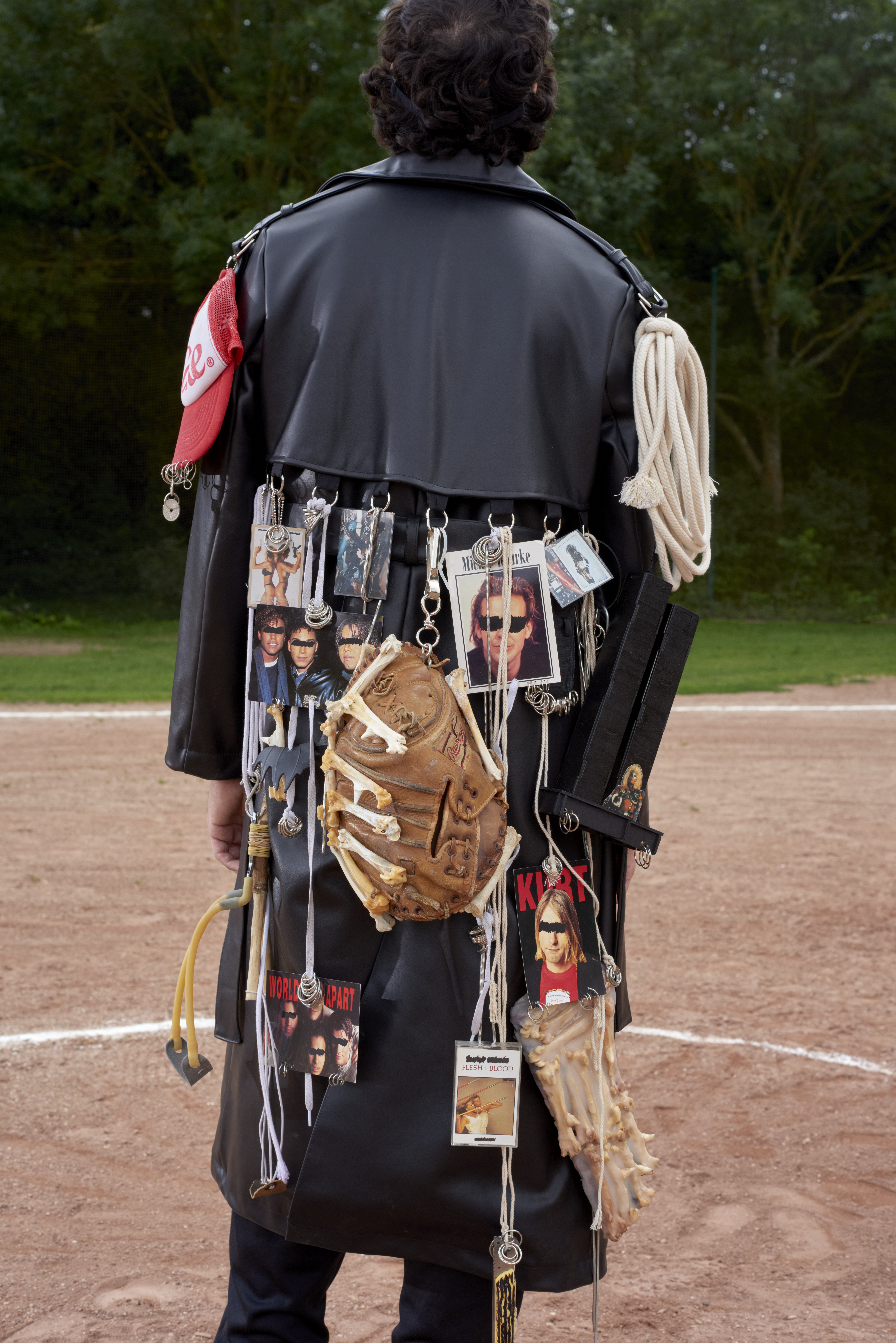 The End coat, 2021. Handmade coat, unique piece. Leather, satin, iron, various objects, variable sizes.