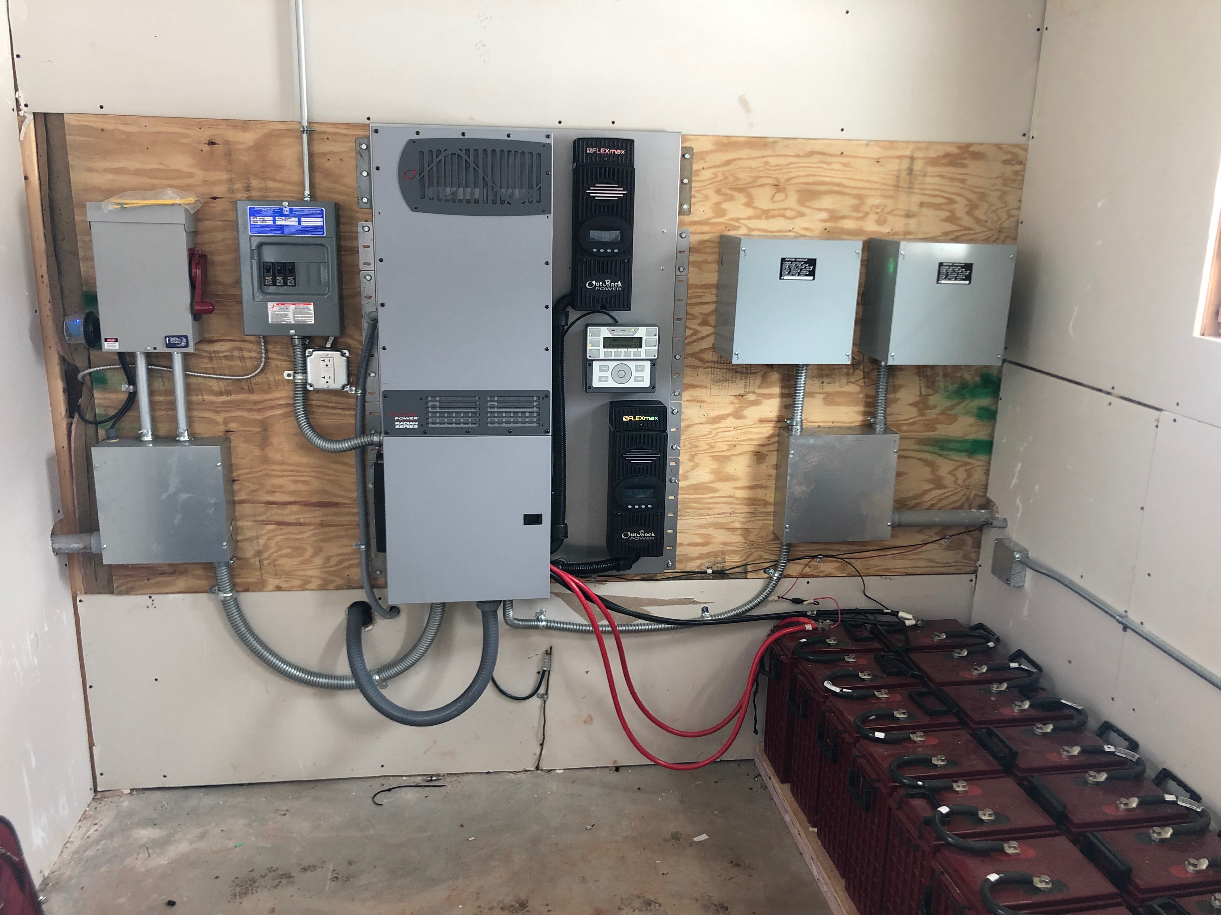 The state-of-the-art mechanical system includes mini split heat pump for backup cooling and dehumidification, a 95% efficient propane water heater for radiant floor and domestic hot water, and continuous exhaust ventilation with passive makeup air. 