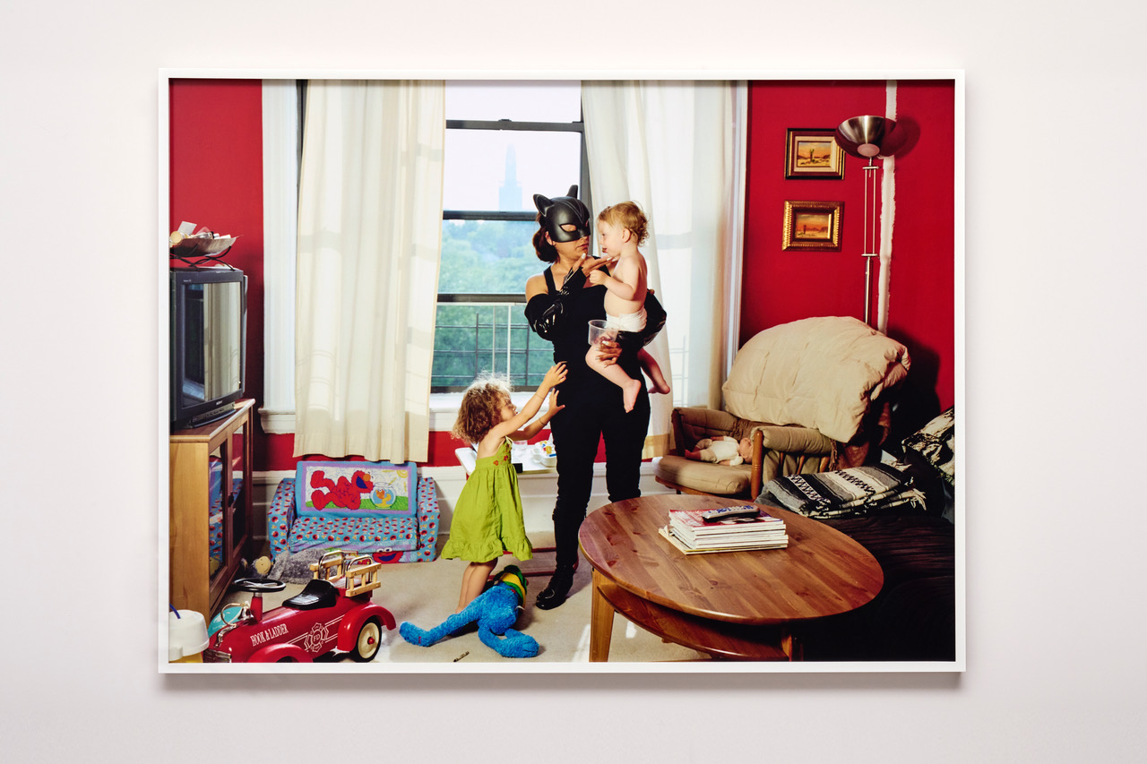 Dulce Pinz&oacute;n, "Catwoman - Minerva Valencia from Puebla, works as a nanny in New York. She sends 400 dollars a week," 2007, photography, 30 x 40 inches. Photo by Go Sugimoto.