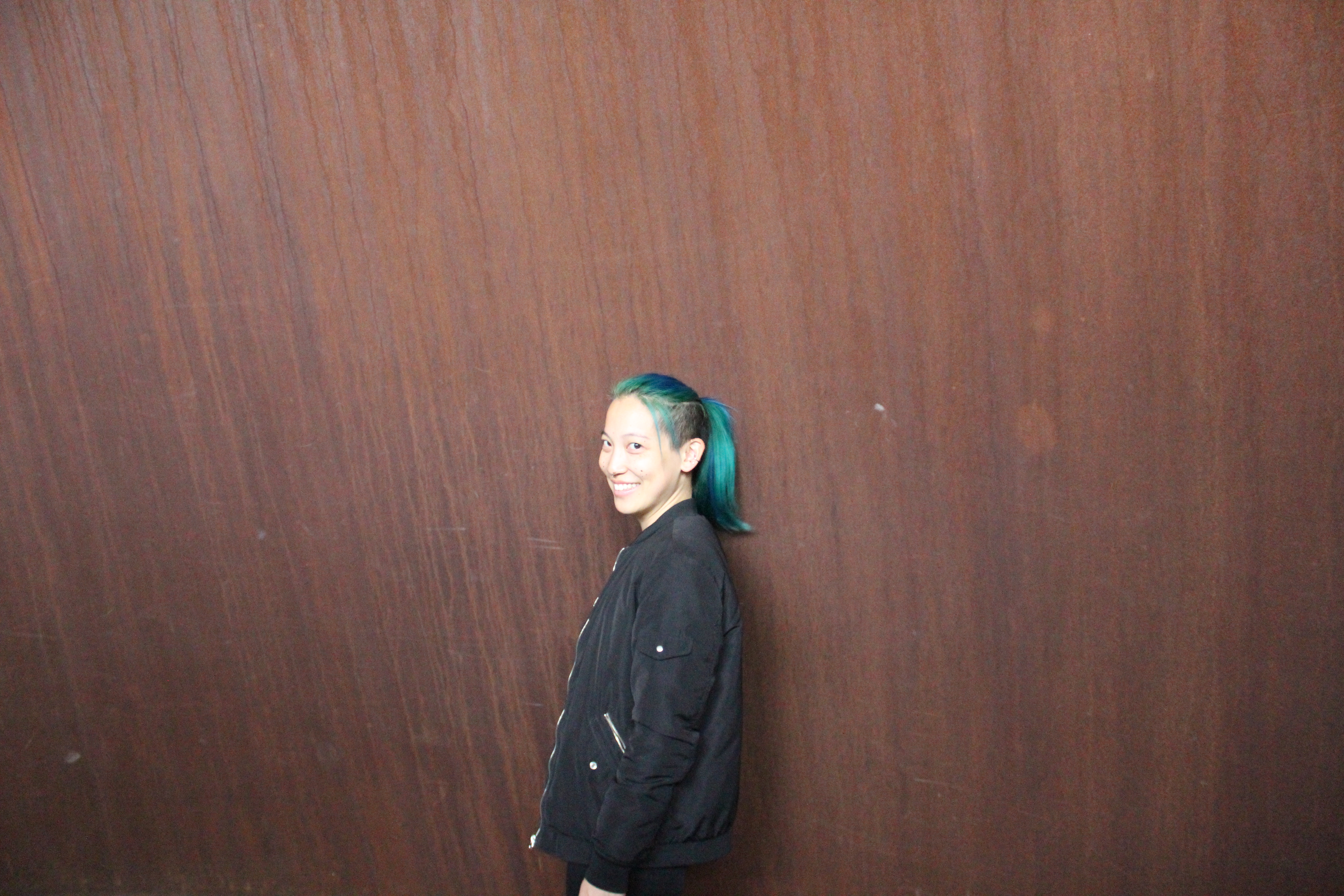 With blue-green hair, at Dia:Beacon