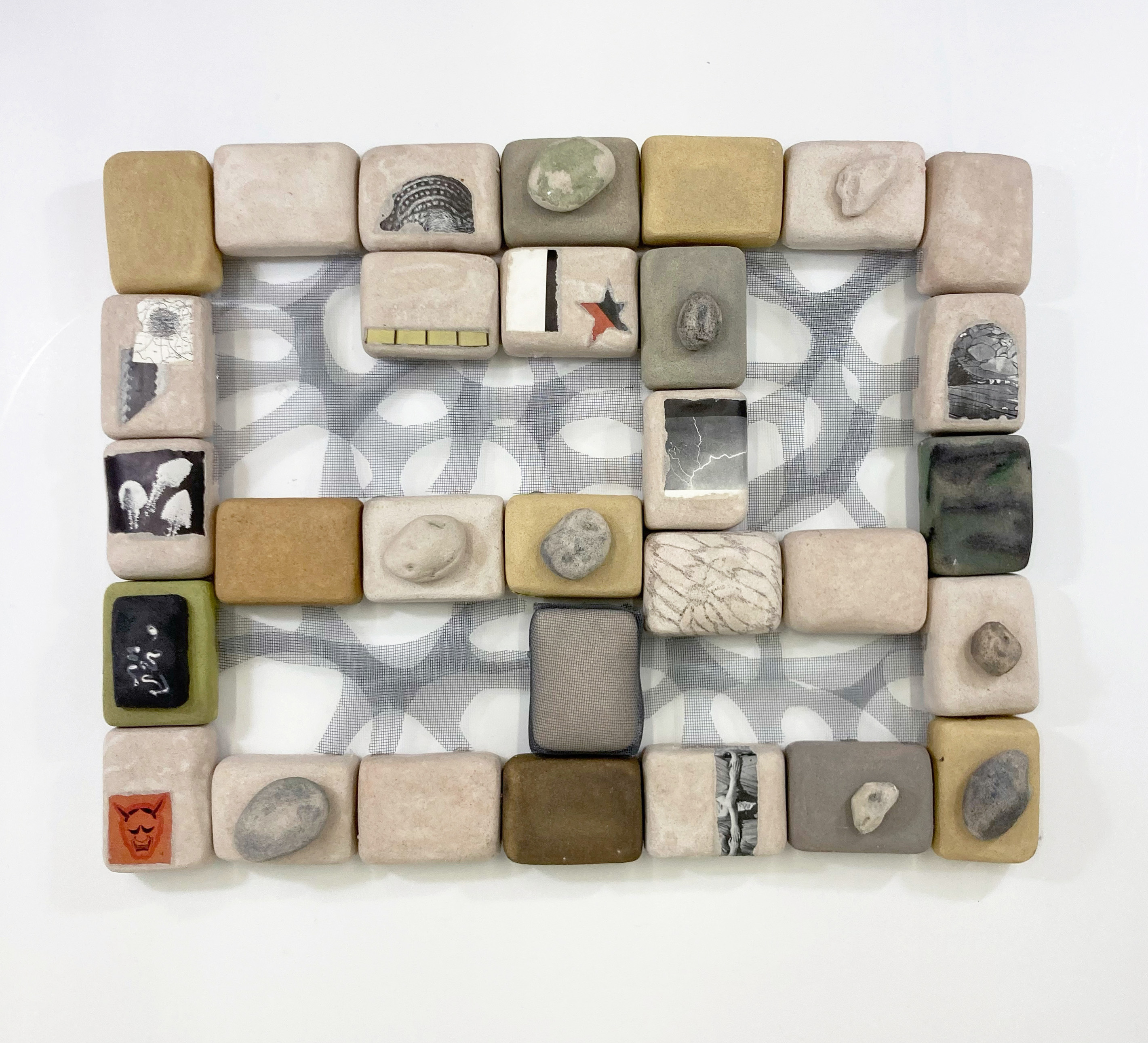 Infrastructure Reboot (Dreaming Stone, Dreaming Bone), 2023, Aluminum mesh, aquaresin, wood, oil paint, chalk pastel, graphite, and collage 22" x 18" x 3"