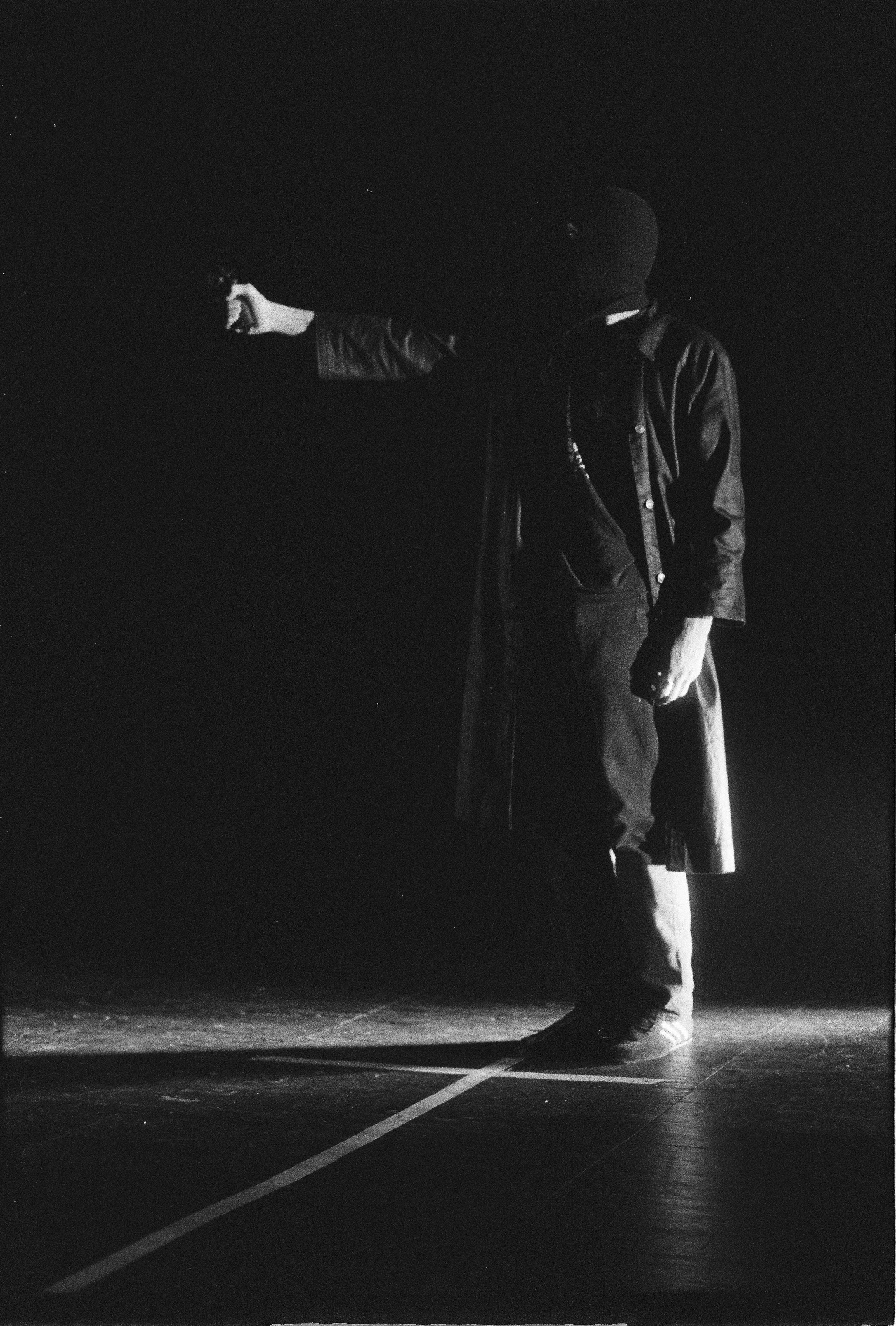 Daniel Rived Pointing a Gun Wearing Balaclava