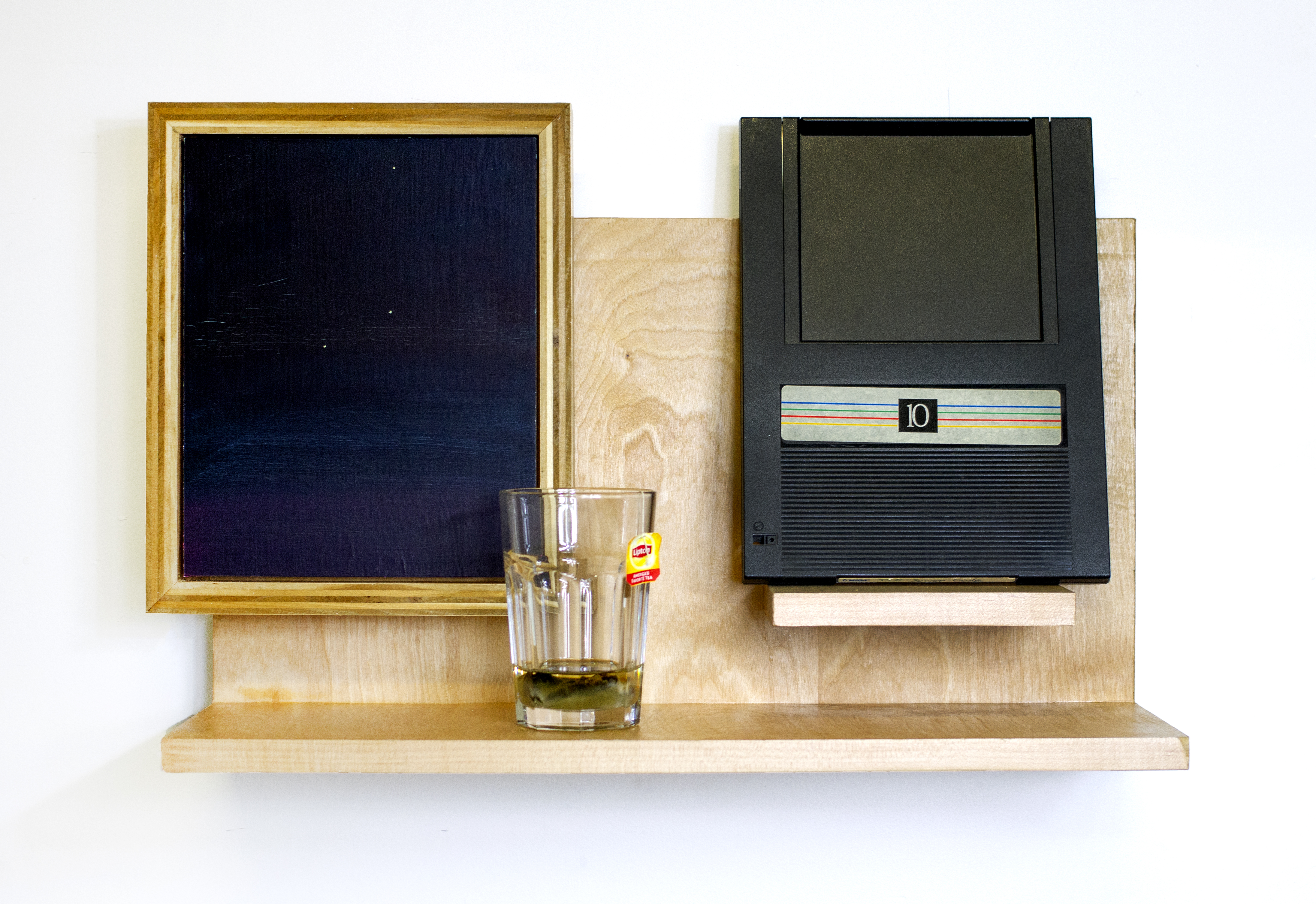 Retable of the Ought Self, 2019, 14" × 22" × 8". Oil on panel, Bernoulli Box, glass, tea bag, epoxy resin, wood, polyurethane 