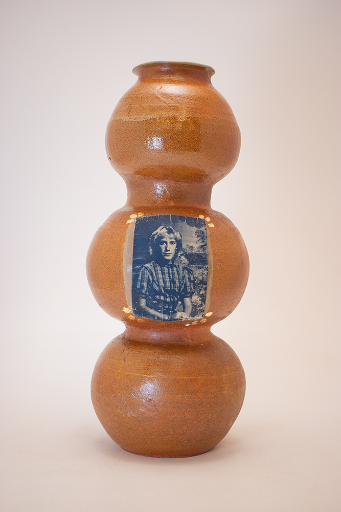 Madonna Vase (Egg) 2024 High soda fired stoneware with cyanotype decal and gold leaf. 6” x 6” x 21”