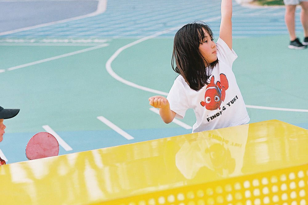 Little girl playing on HEROair outdoor table tennis table at Western Australia