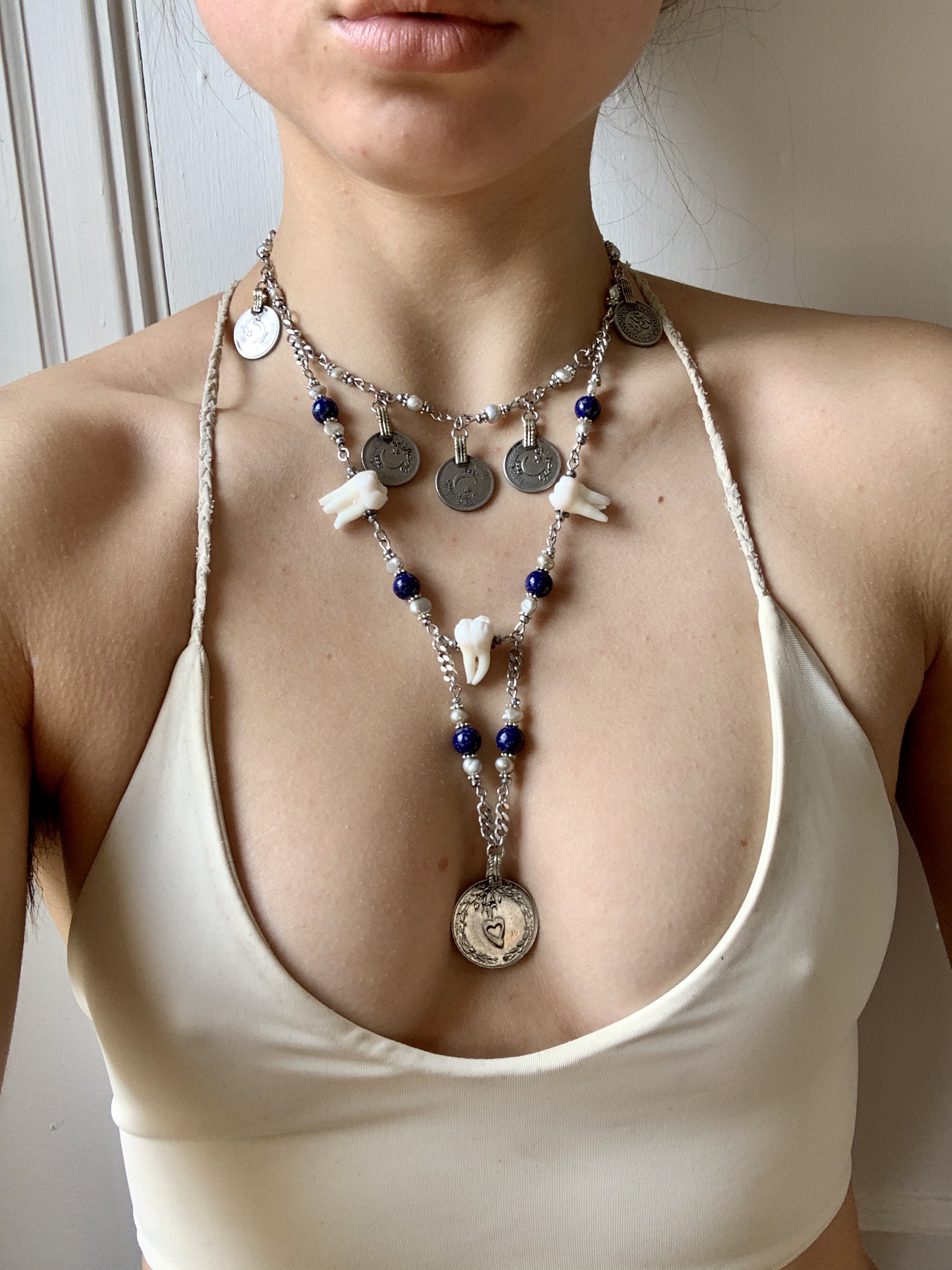 A custom piece using wisdom teeth.