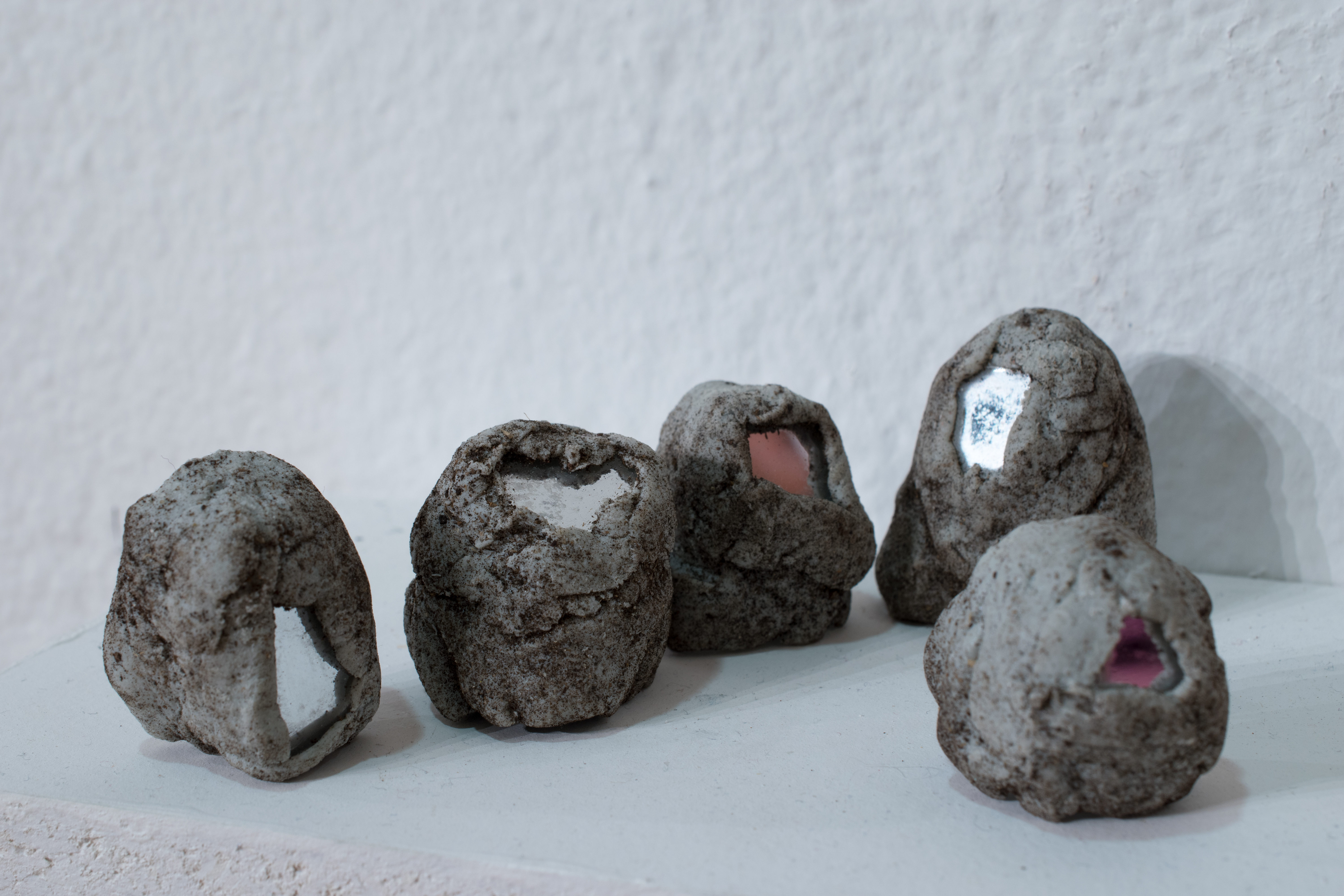 5 finger rocks; sensors, 2018 dirt, mirror, epoxy clay