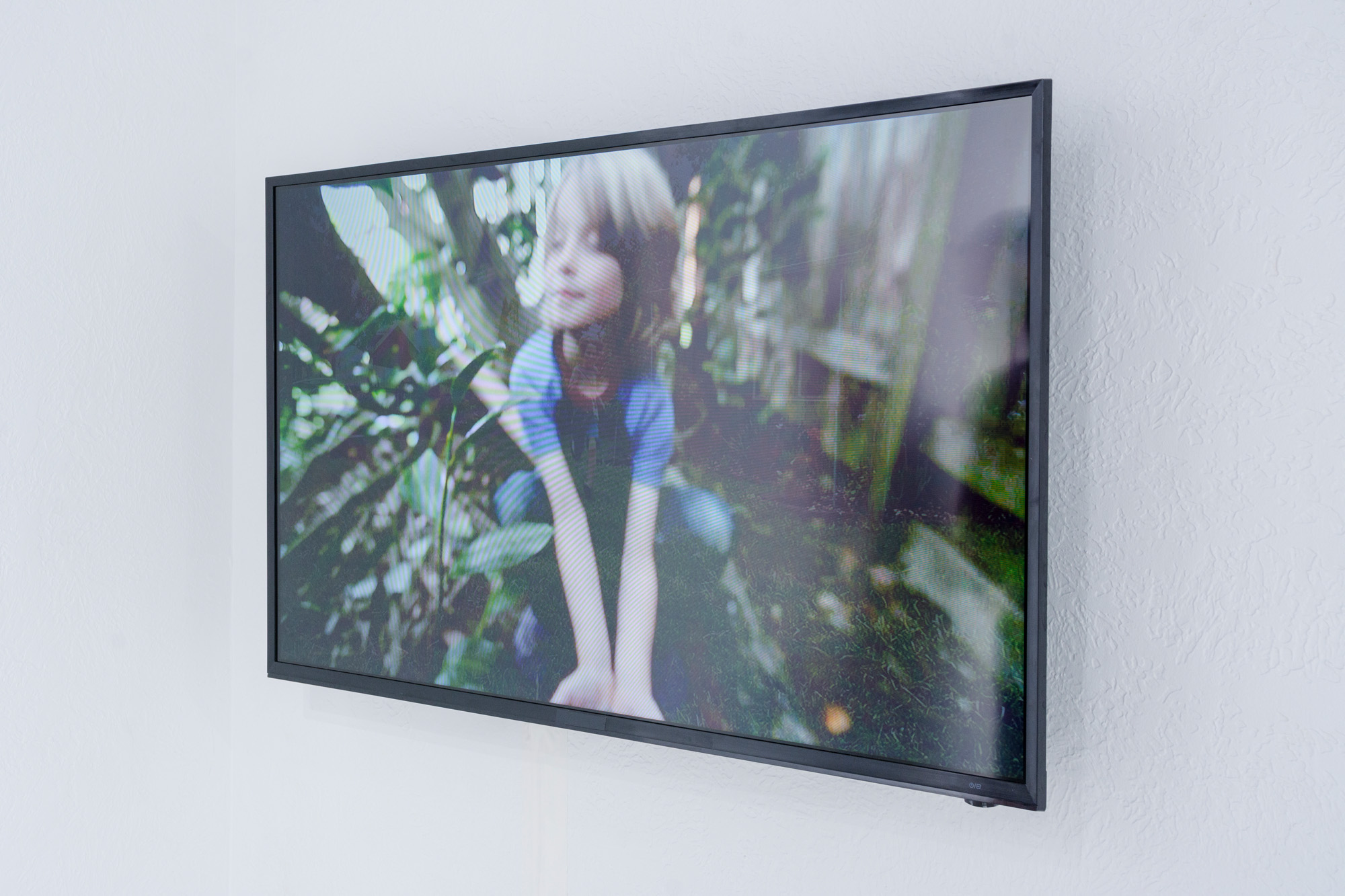 Stills from We Live As Artists and Performers in the Backyard, digital video, 12 minutes (looping), 2020