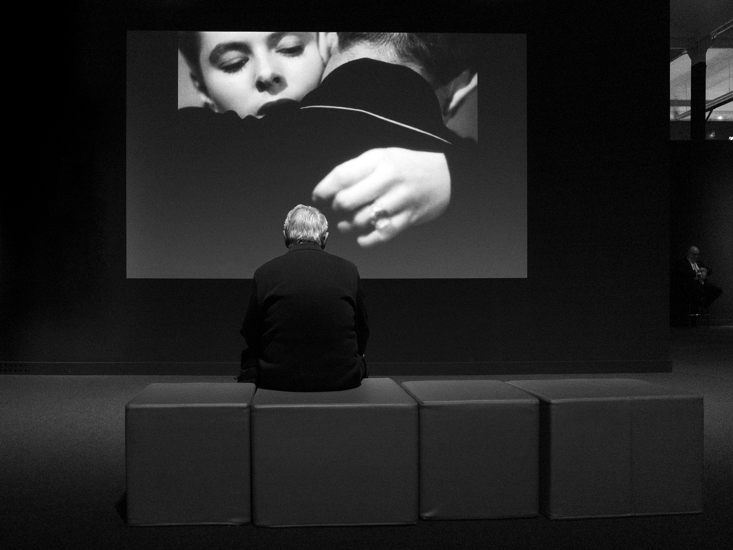 Visitor and guard at an exhibitionBarcelona, Spain, 2024