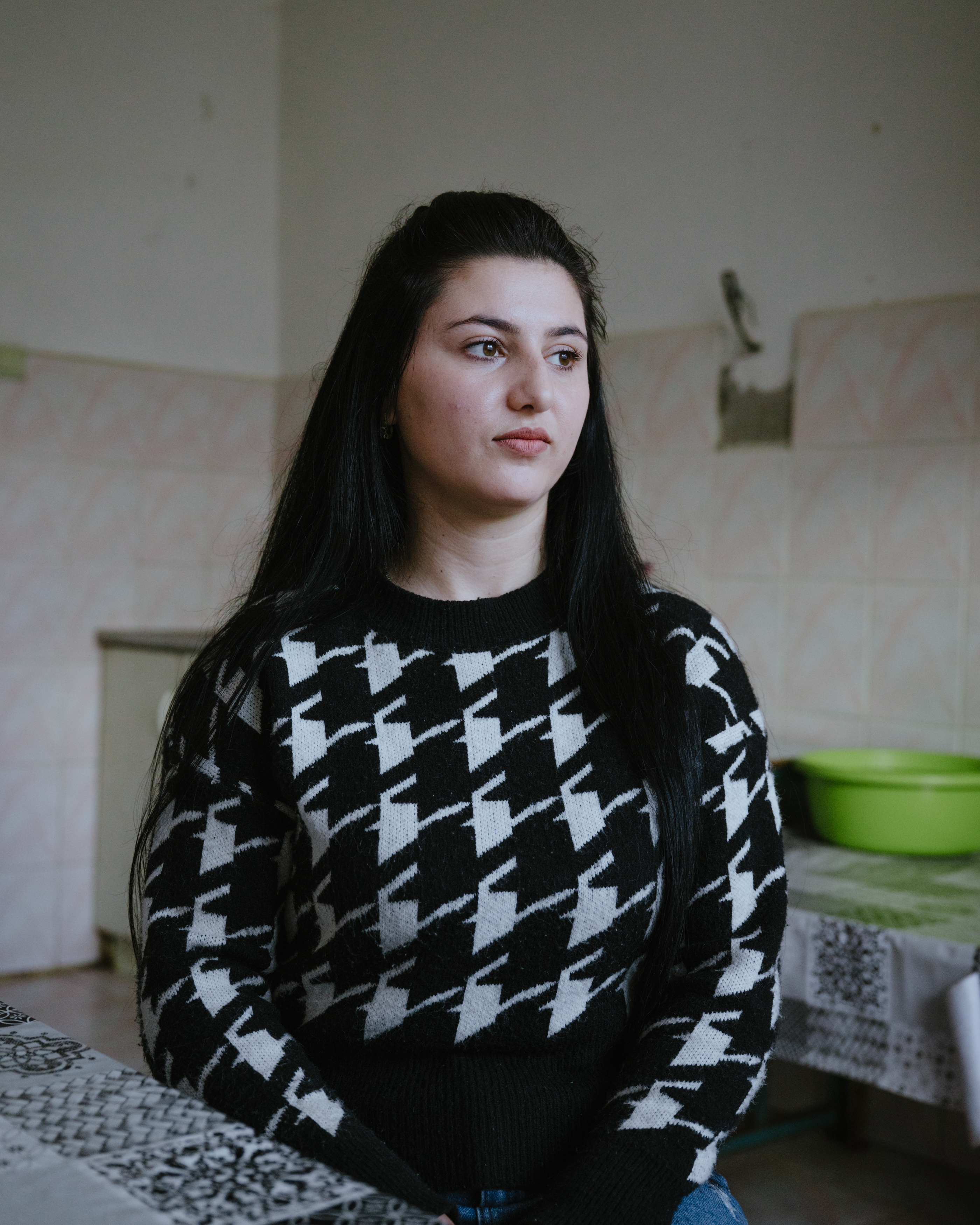 Arpine, 21 years old, in her home village Khnatsakh close to the Azerbaijani border