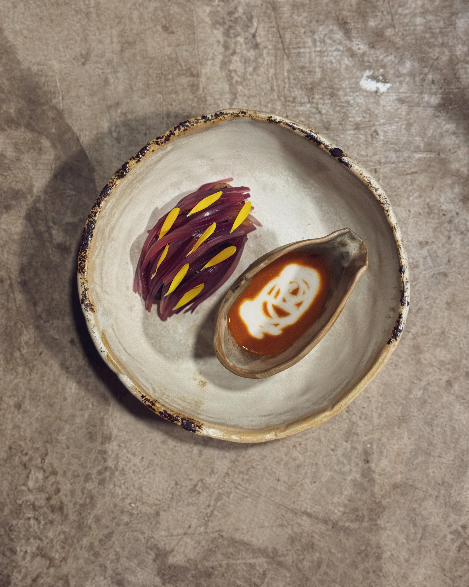 Preparación gastronómica en ALQA basada en técnicas de fermentación de maíz andino. Andean corn fermentation dish created at ALQA as part of the culinary workshop.