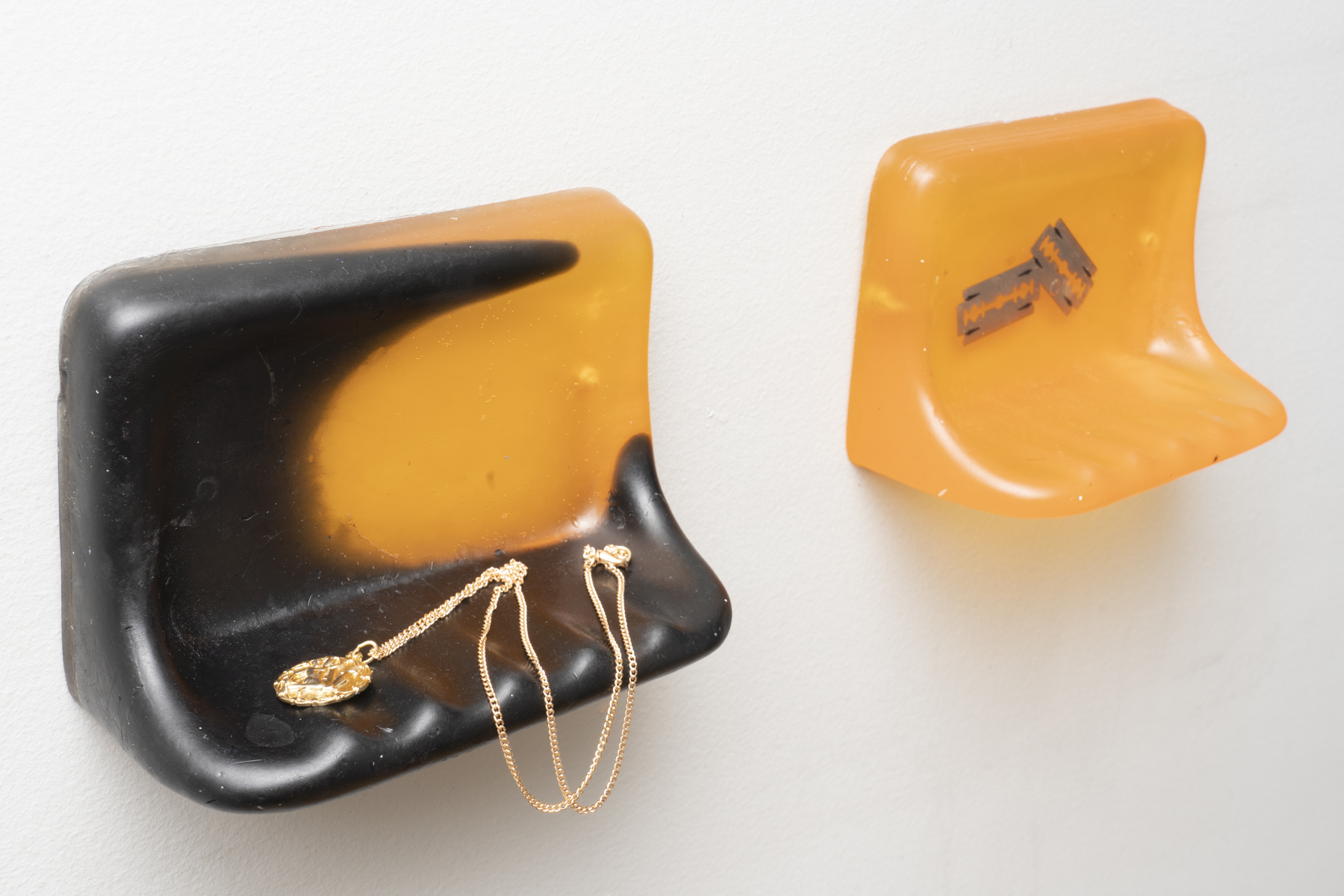 Hostings; soap, chain necklace, medallion, razor blades Photography: Jesse Meredith