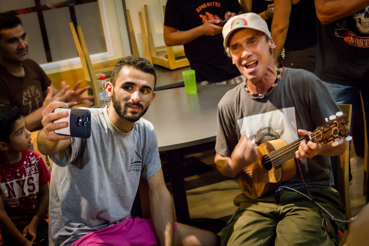 Manu Chao performing in City Plaza for its residents.
