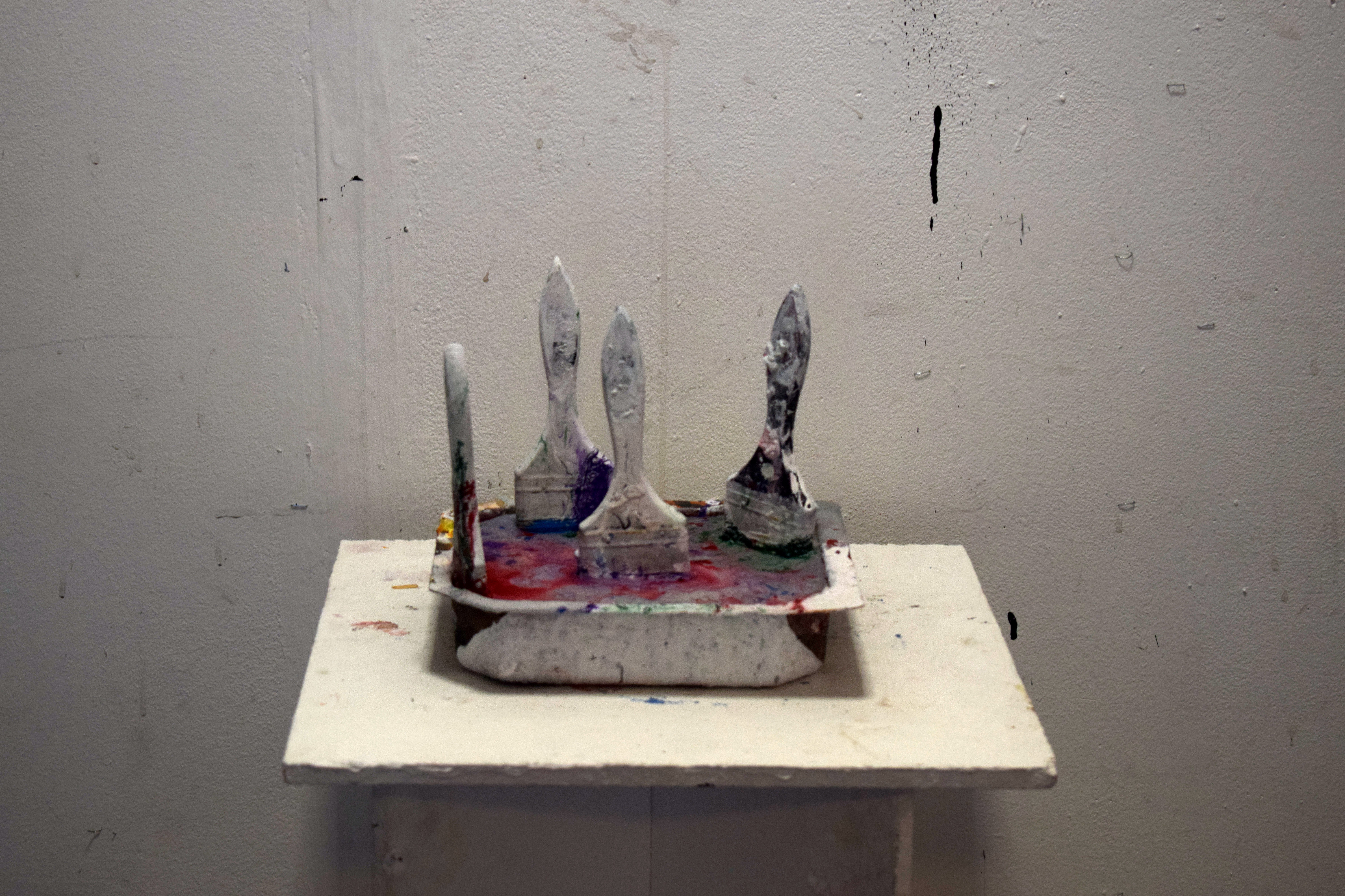 4 men in a tub, paintbrushes, plaster and tub, 2019 