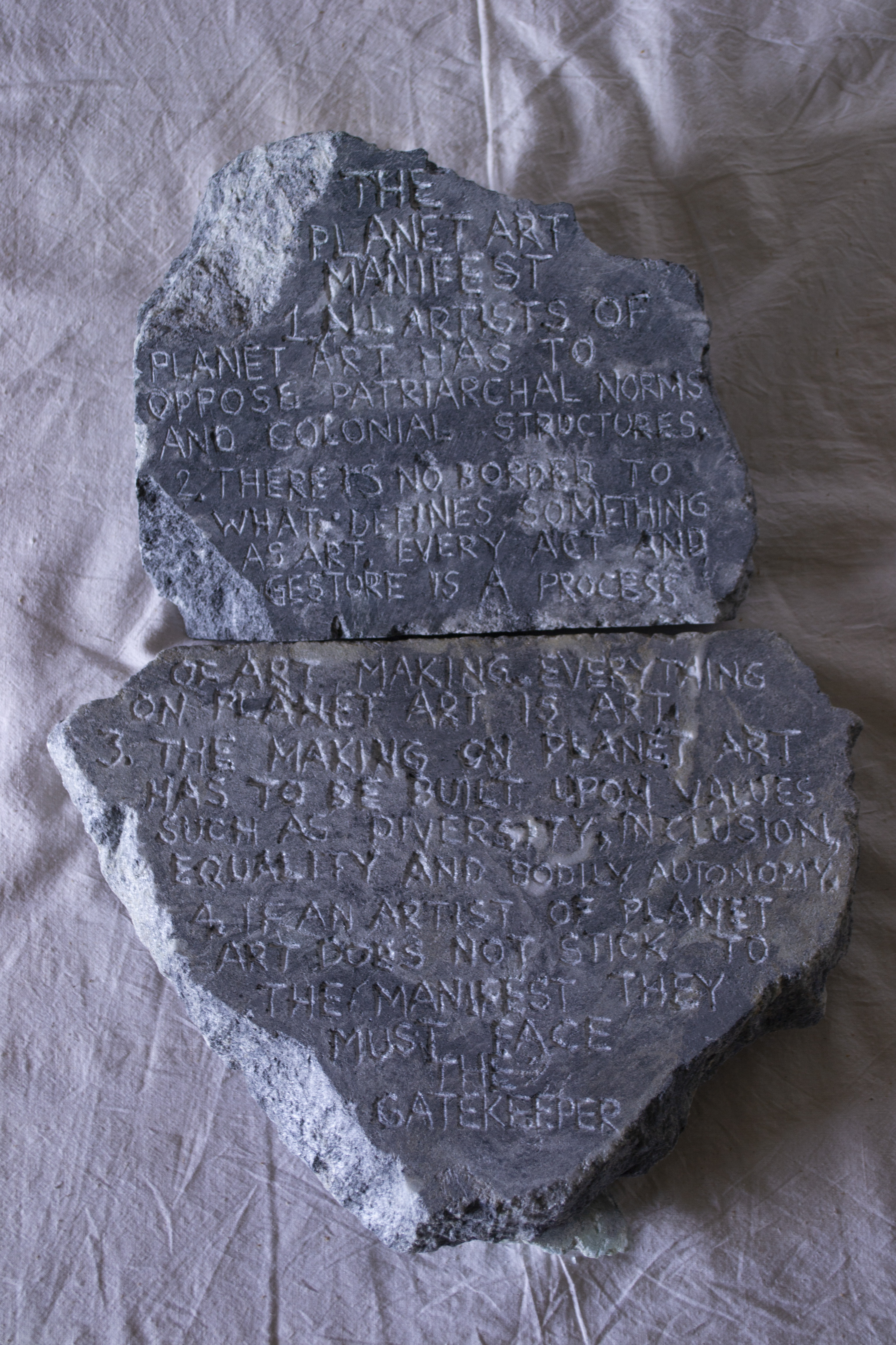 1. All Artists of Planet Art have to oppose patriarchal norms and colonial structures. 2. There is no border to what defines something as art. Every act and gesture is a process of art making. Everything on Planet Art is art. 3. The making on Planet Art has to be built upon values such as diversity, inclusion, equality, and bodily autonomy. 4. If an Artist of Planet Art does not stick to the manifest, they must face The Gatekeeper.